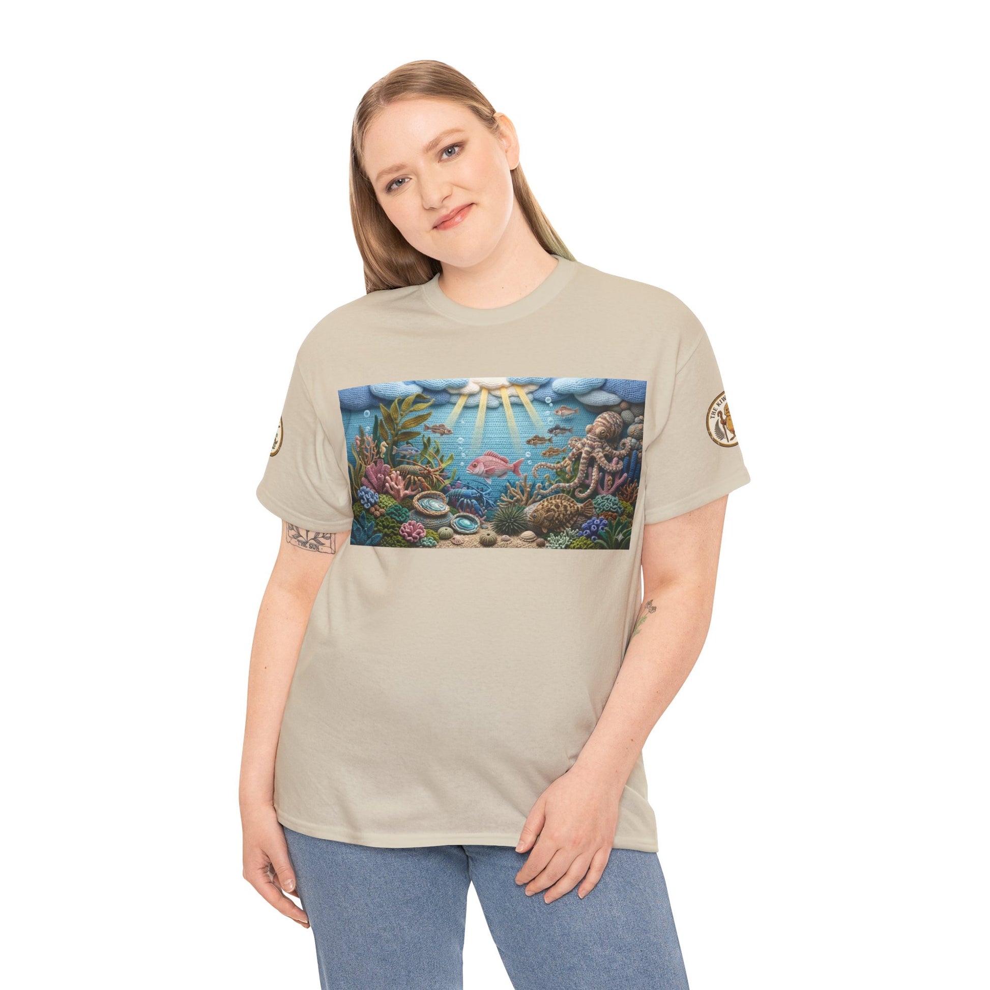 Under the sea graphic T-shirt on model, light beige crew neck with ocean scene print