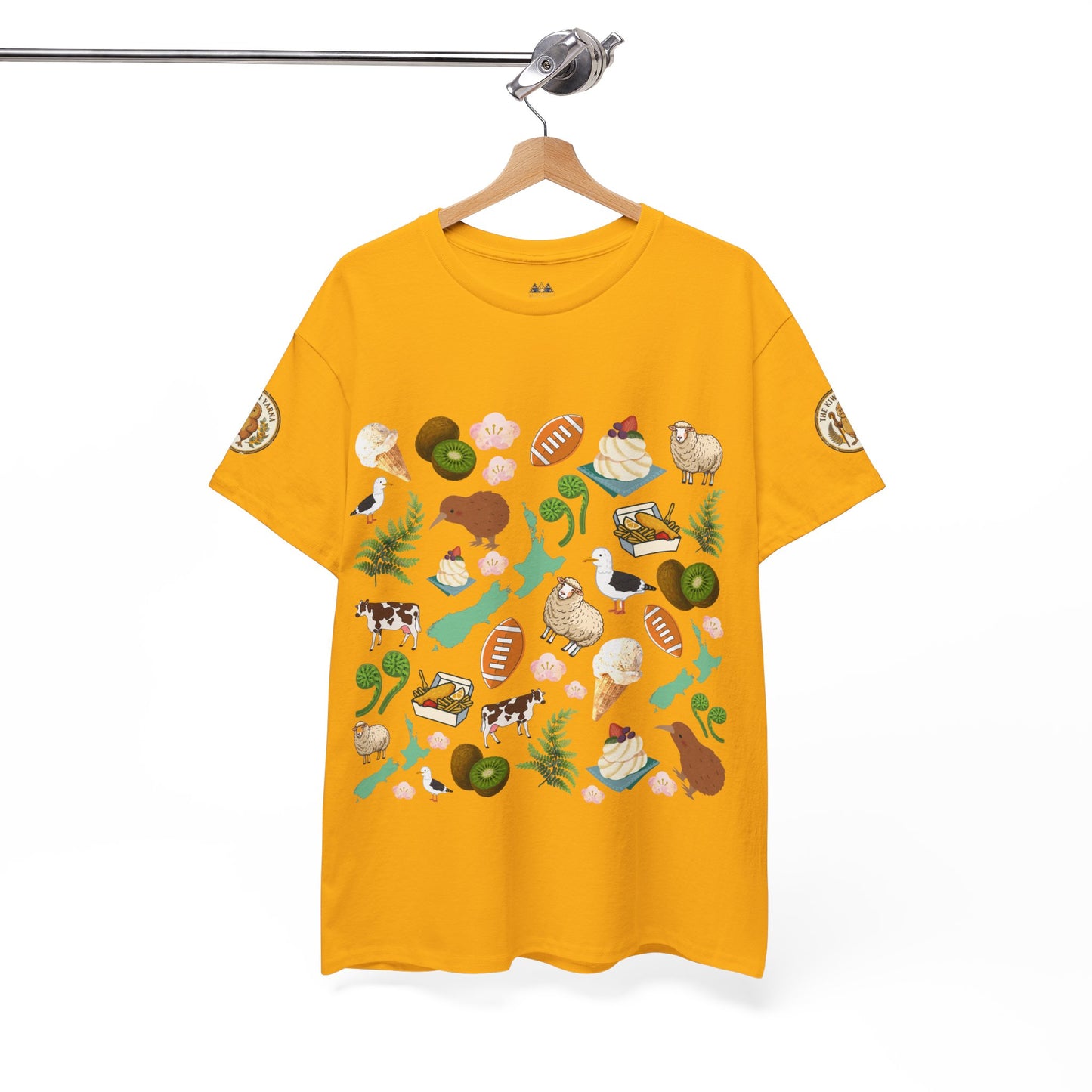 Mustard yellow short-sleeve T-shirt with centered Kiwiana native foods and wildlife graphic.