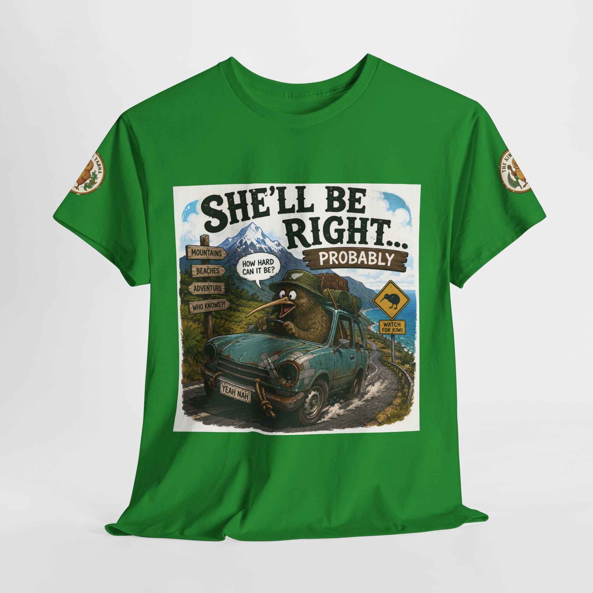 Green graphic T-shirt with centered car scene artwork and sleeve patches.