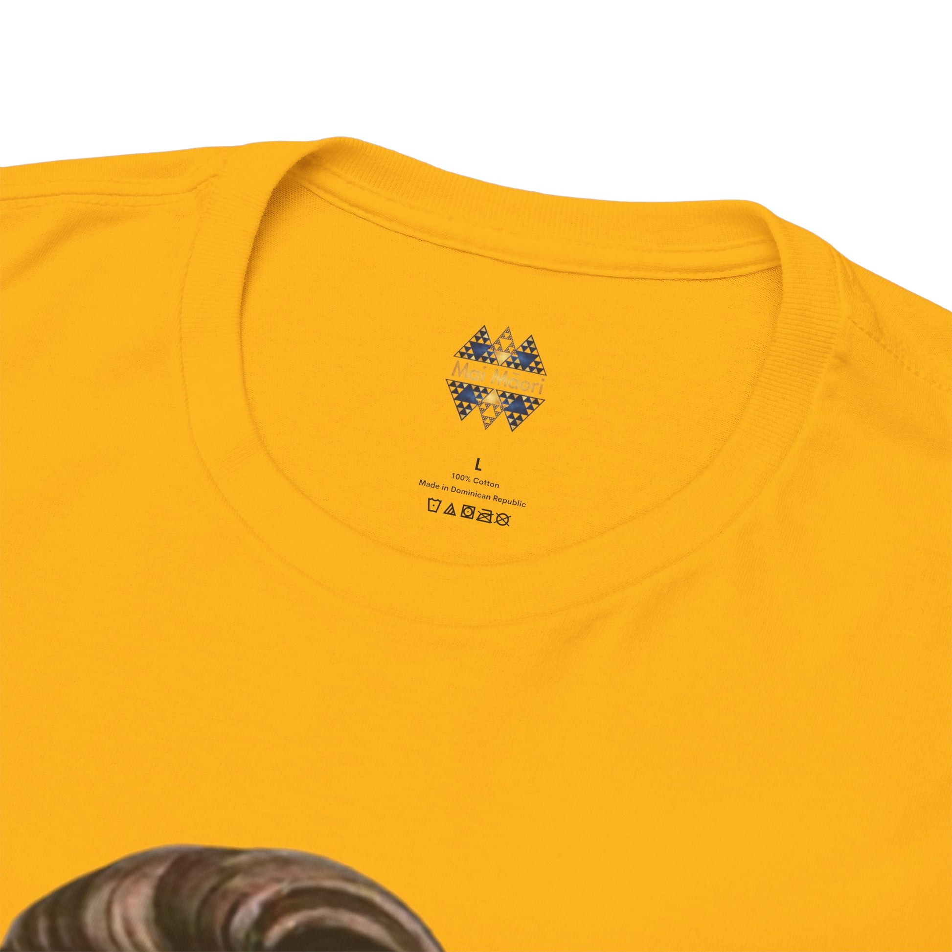 Mustard yellow t-shirt neckline with small patterned logo at center chest.
