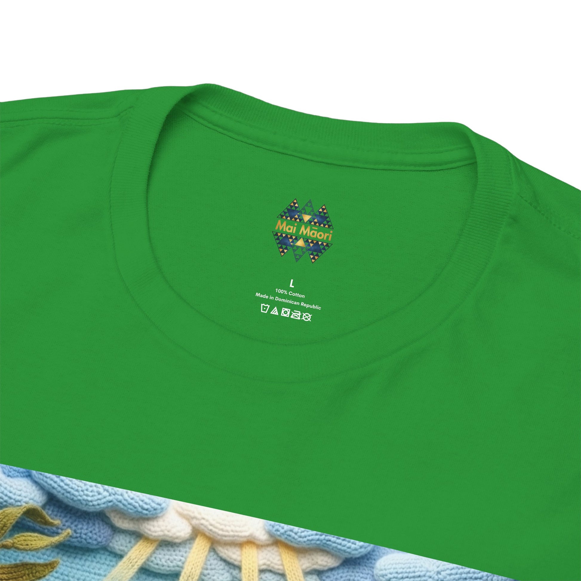 Green crew-neck T-shirt with Mai Moai heart logo under collar
