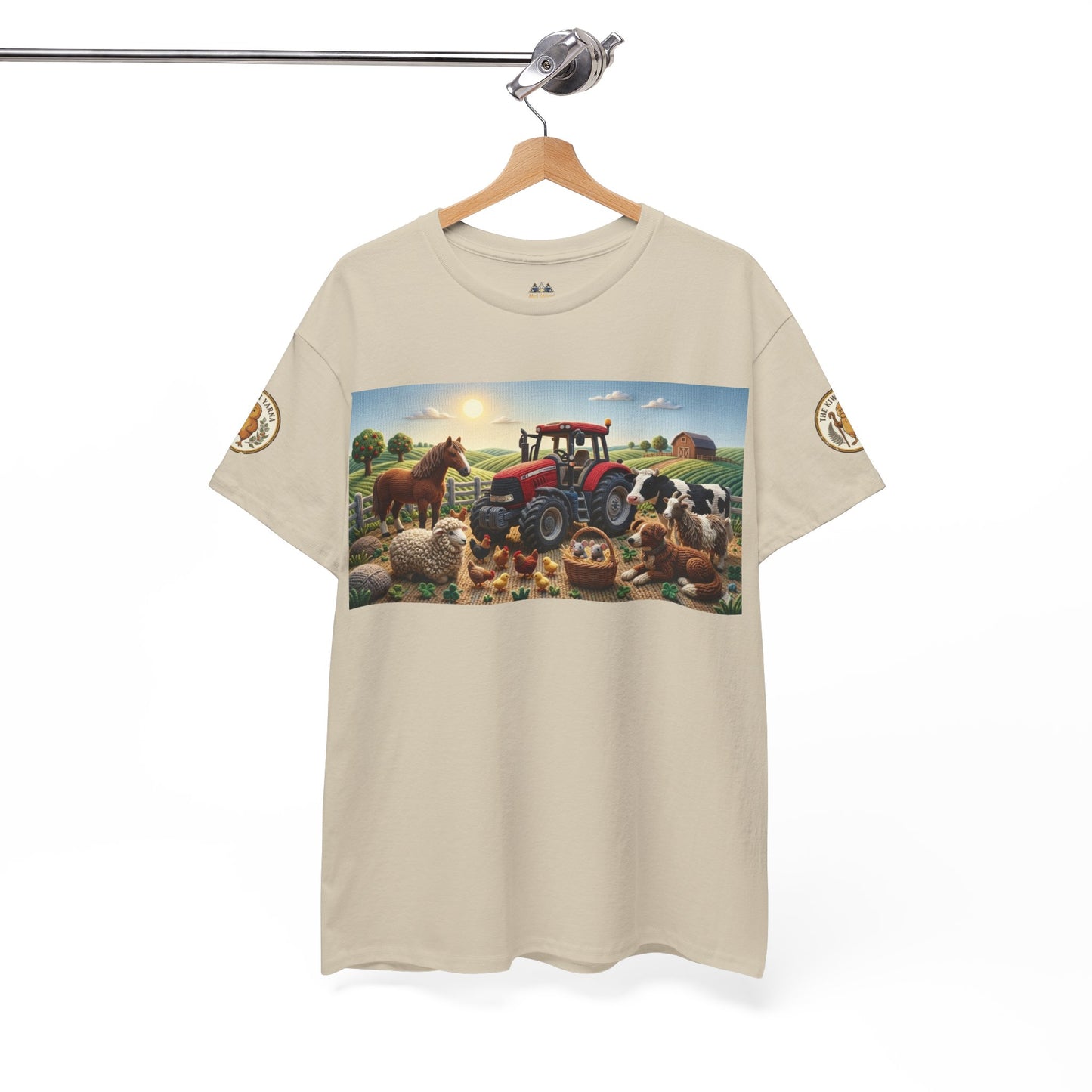 Natural beige T-shirt on hanger with front farm scene graphic and circular sleeve patch