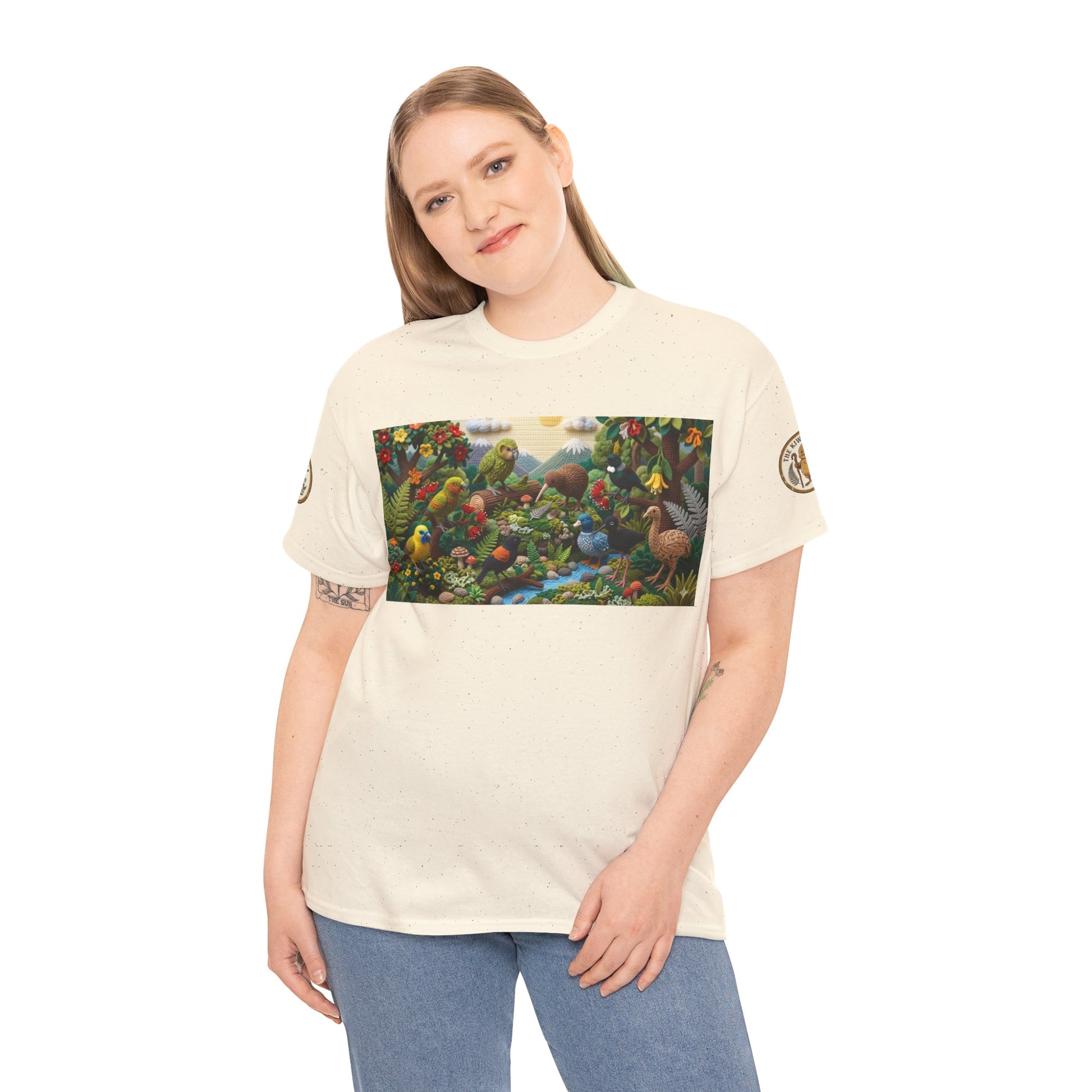Off-white crew-neck t-shirt worn with colorful bird-and-forest rectangle graphic