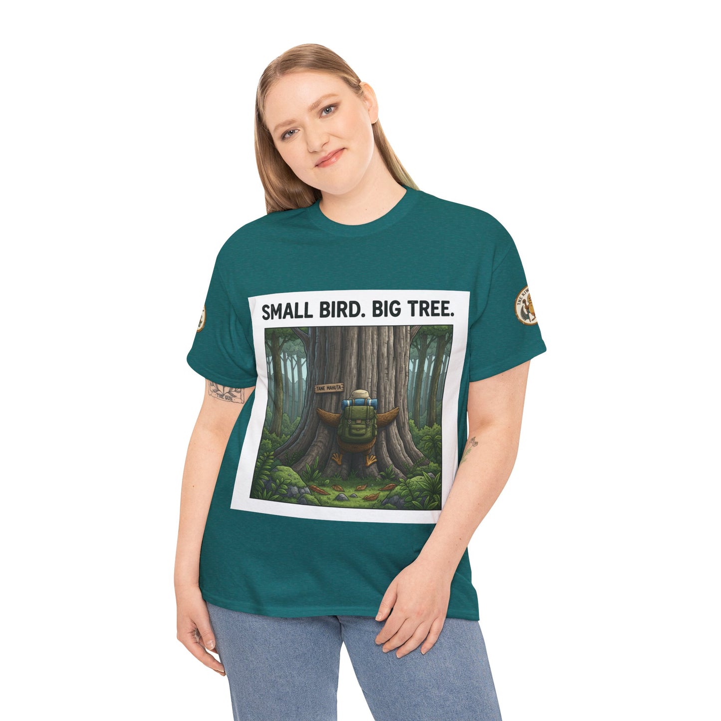 Teal crew-neck T-shirt with centered white-framed forest scene graphic