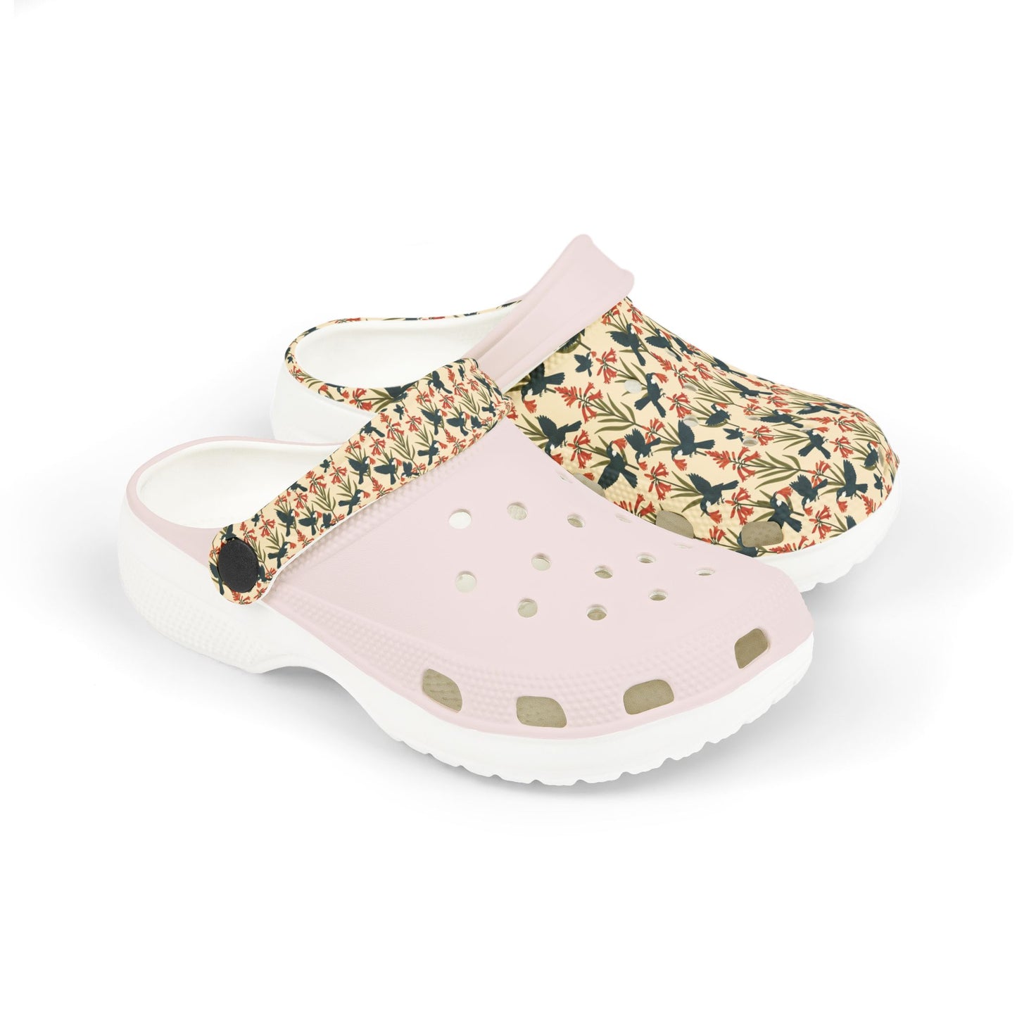 Kids slip-on clog shoes with floral print, perforated vents, light pink collar and white sole.