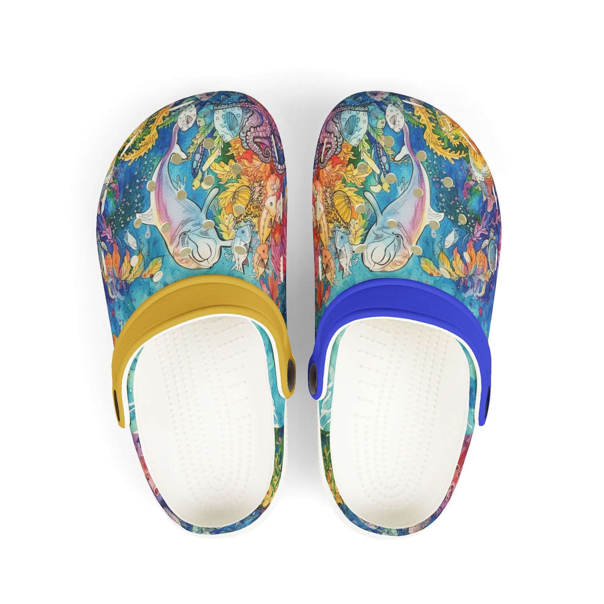 Kids slip-on clogs with dolphin reef print, white footbed, yellow and blue heel accents.