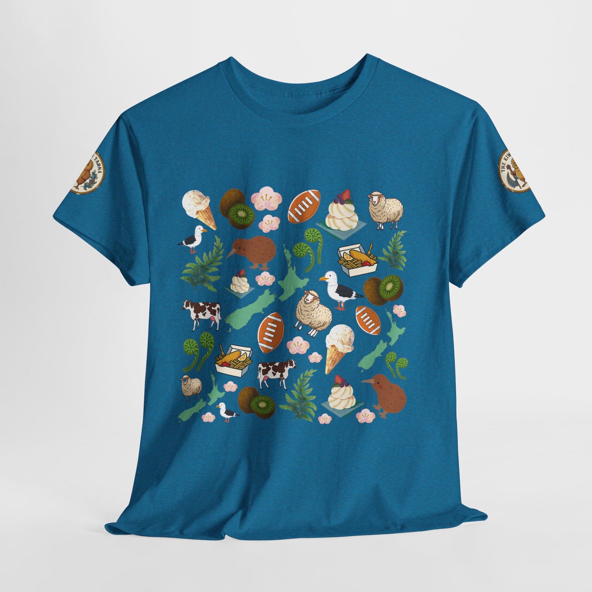Teal graphic T-shirt with colorful wildlife and plant collage print on front
