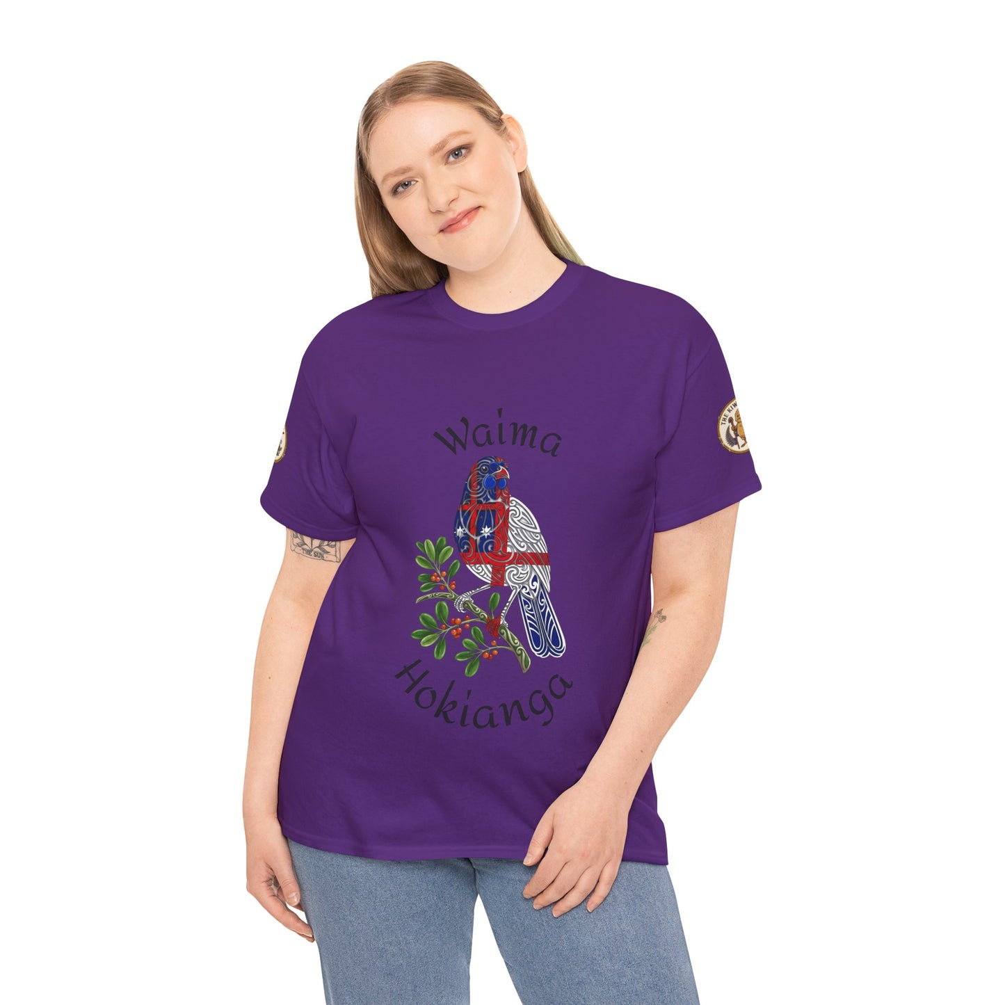 Purple T-shirt worn by model, featuring front bird and floral graphic and arched text
