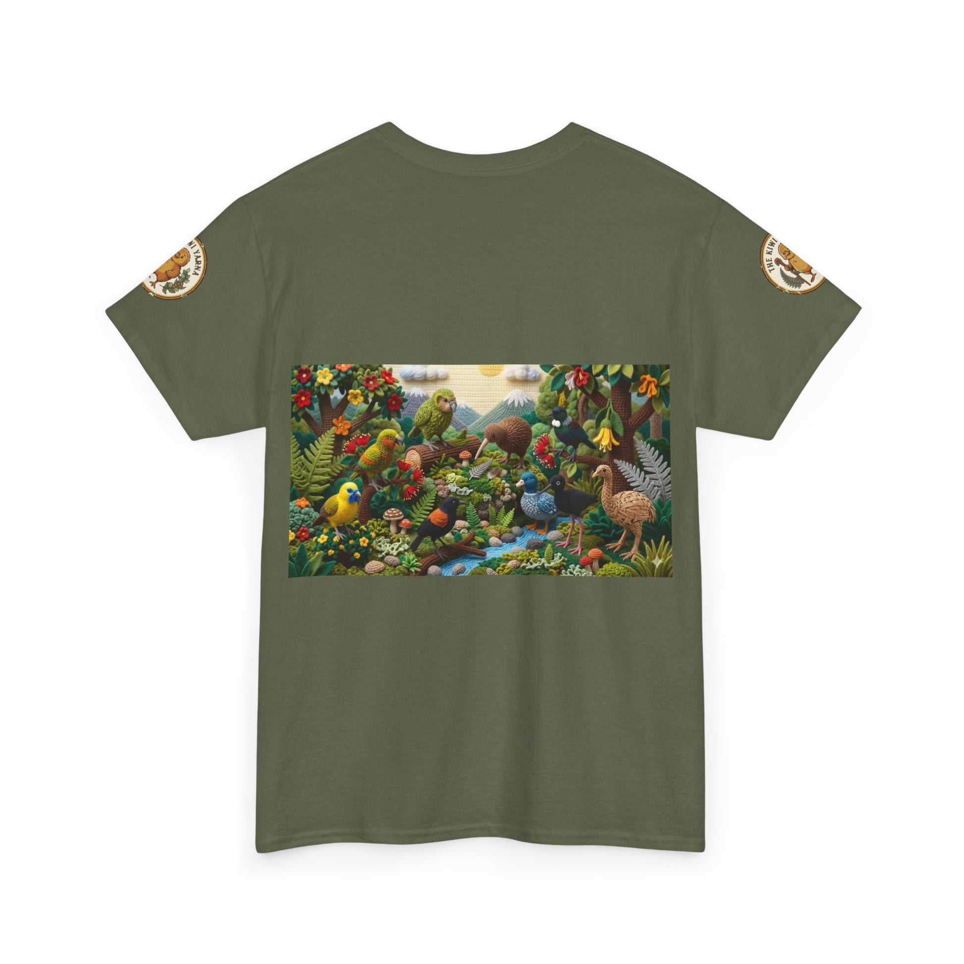Olive green crewneck T-shirt with colorful bird-and-forest rectangular graphic and sleeve patches