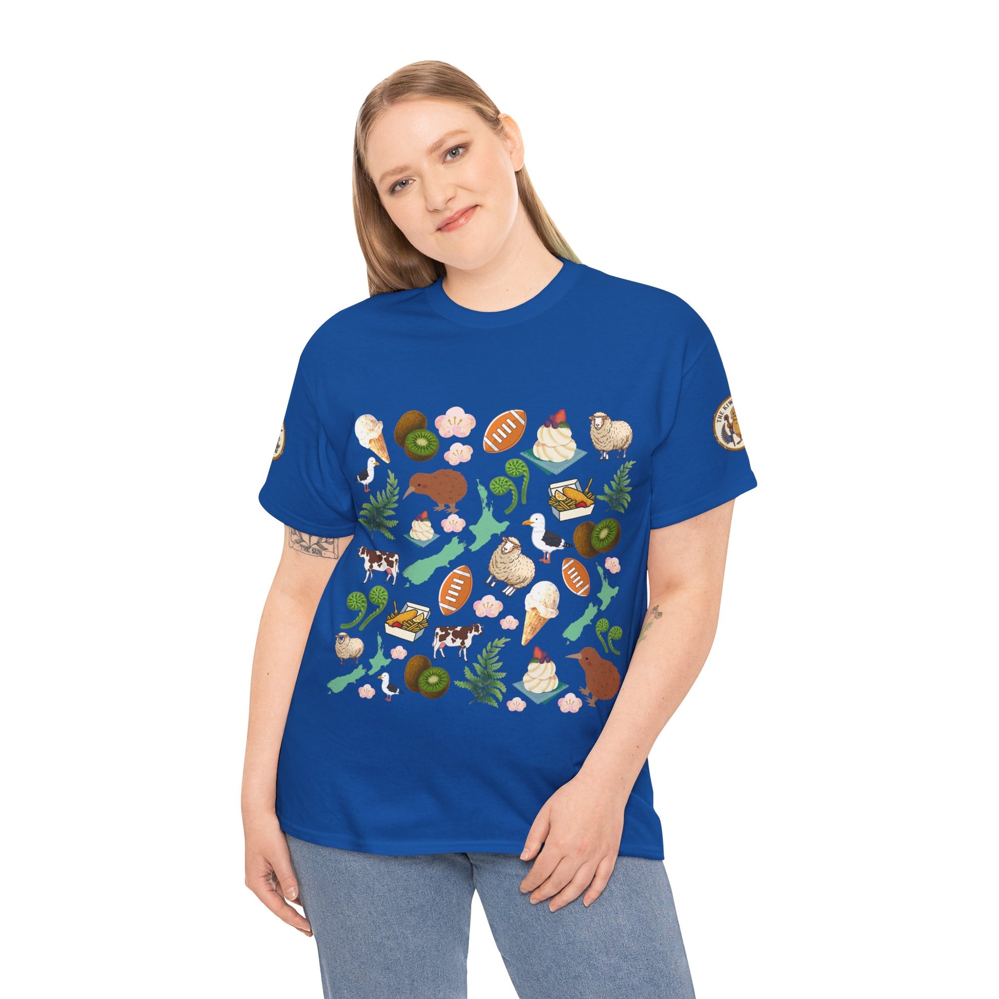 Kiwiana graphic T-shirt on model in antique sapphire blue, crew neck with large wildlife collage