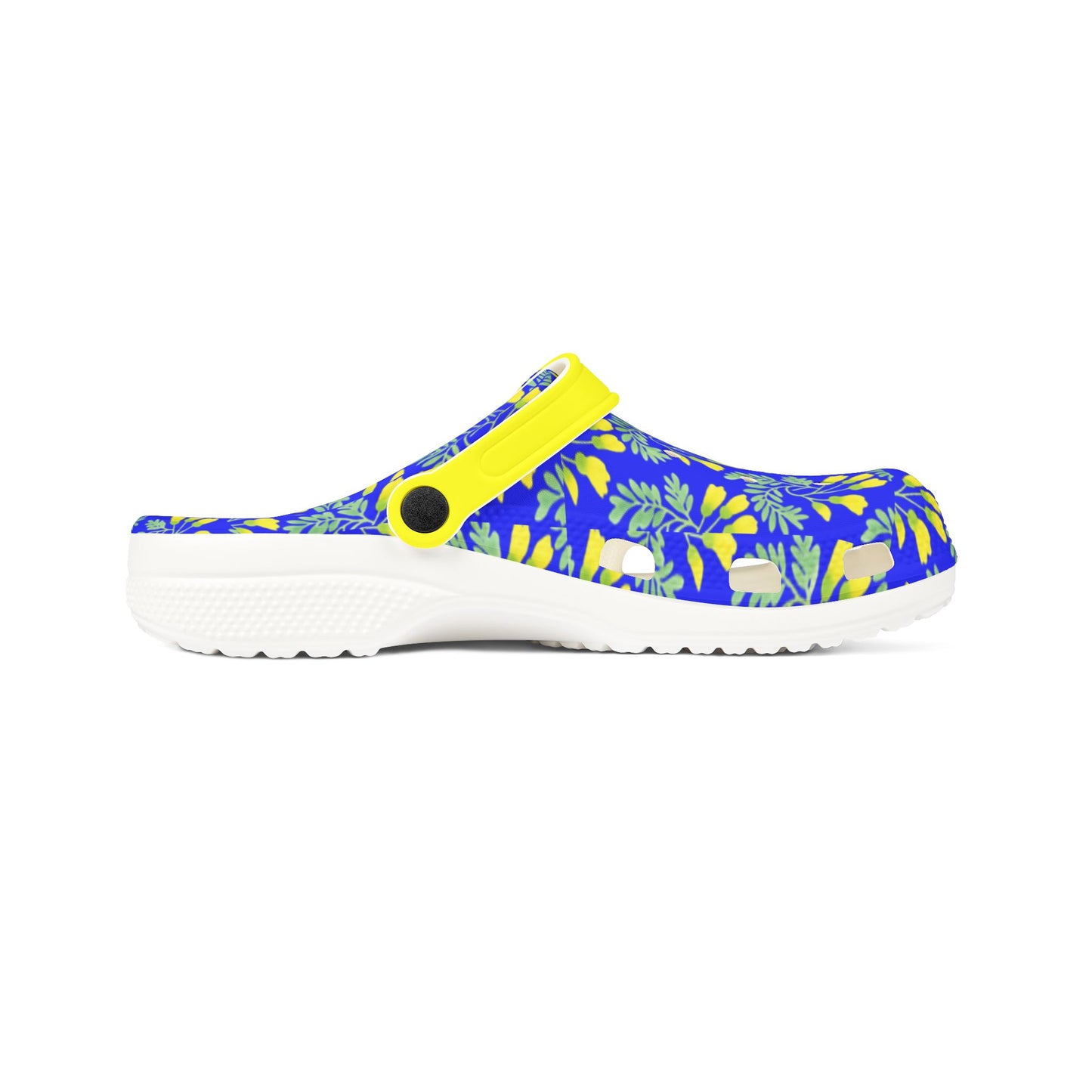 Kōwhai slip-on clogs, blue leaf print upper with yellow strap, white outsole