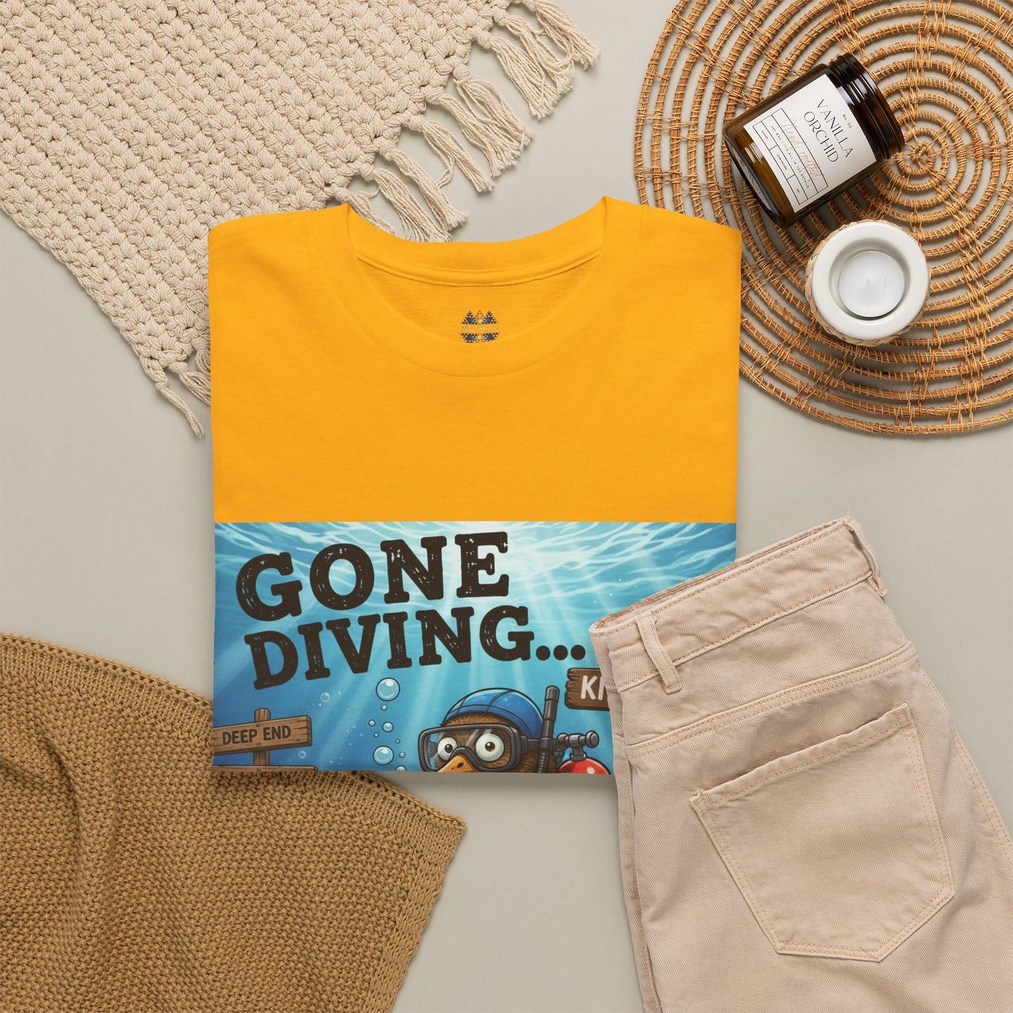 Yellow kids graphic T-shirt with ocean diver cartoon panel on the front