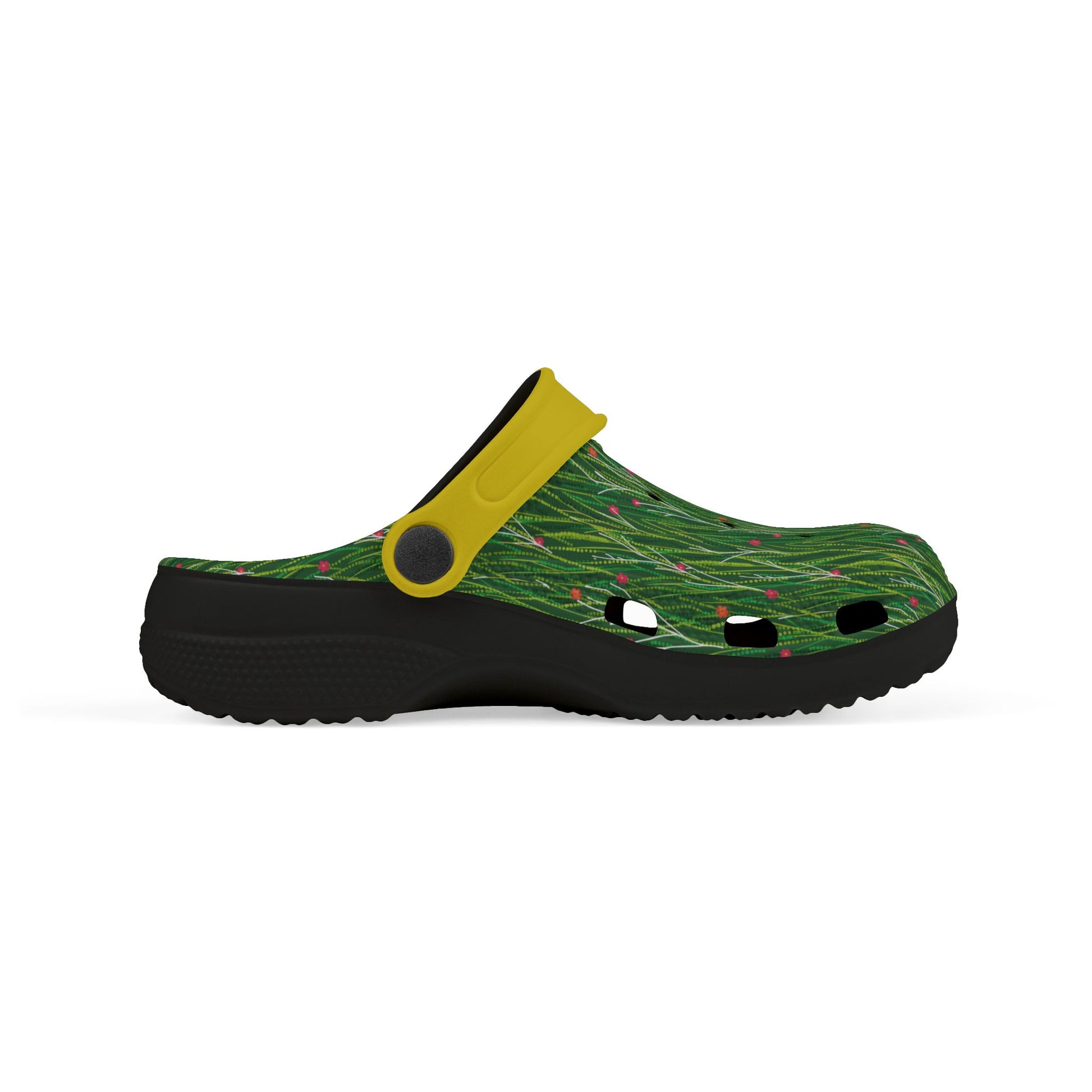 Green patterned slip-on clog with yellow strap and black sole, profile