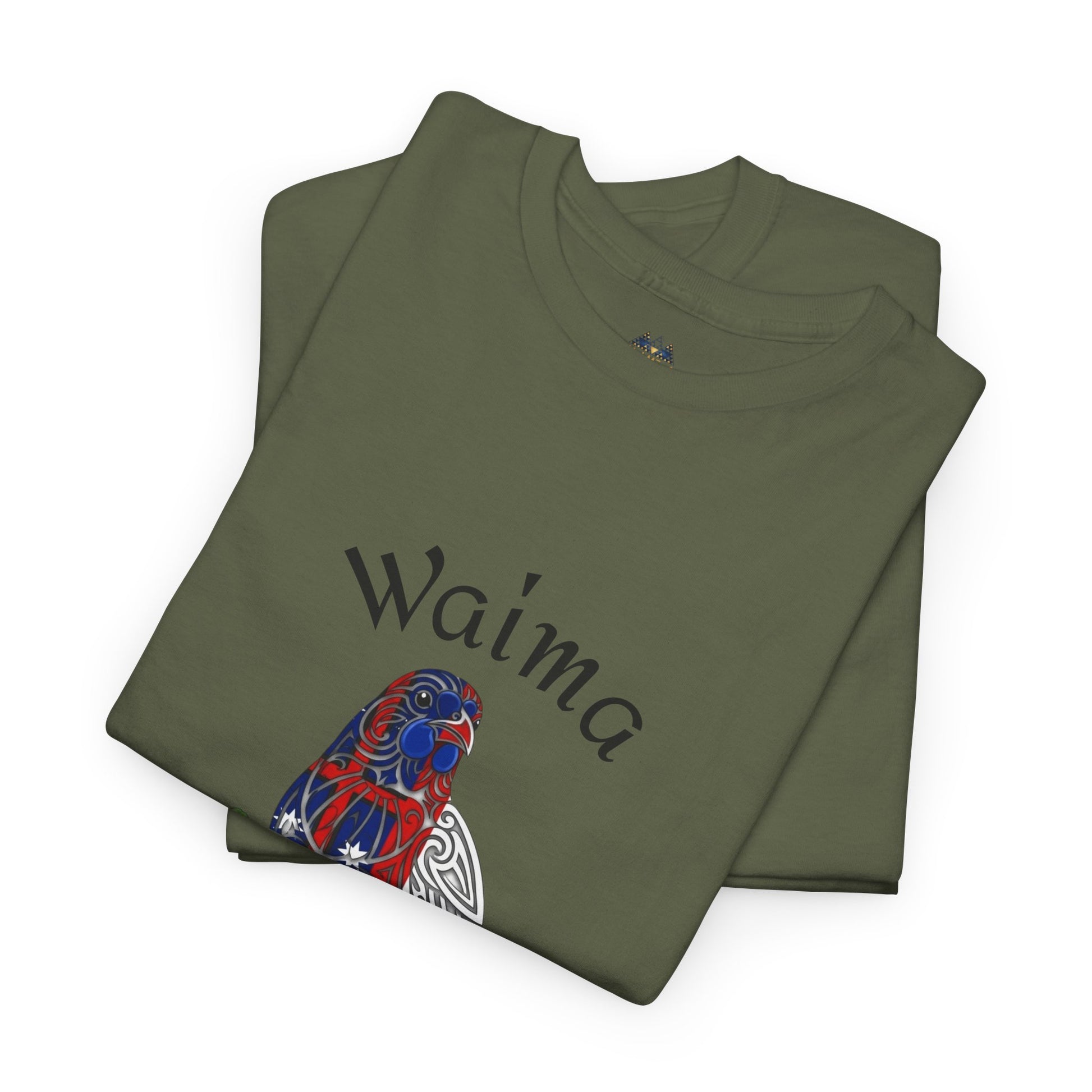 Folded olive green graphic T-shirt with "Waima" print and bird illustration