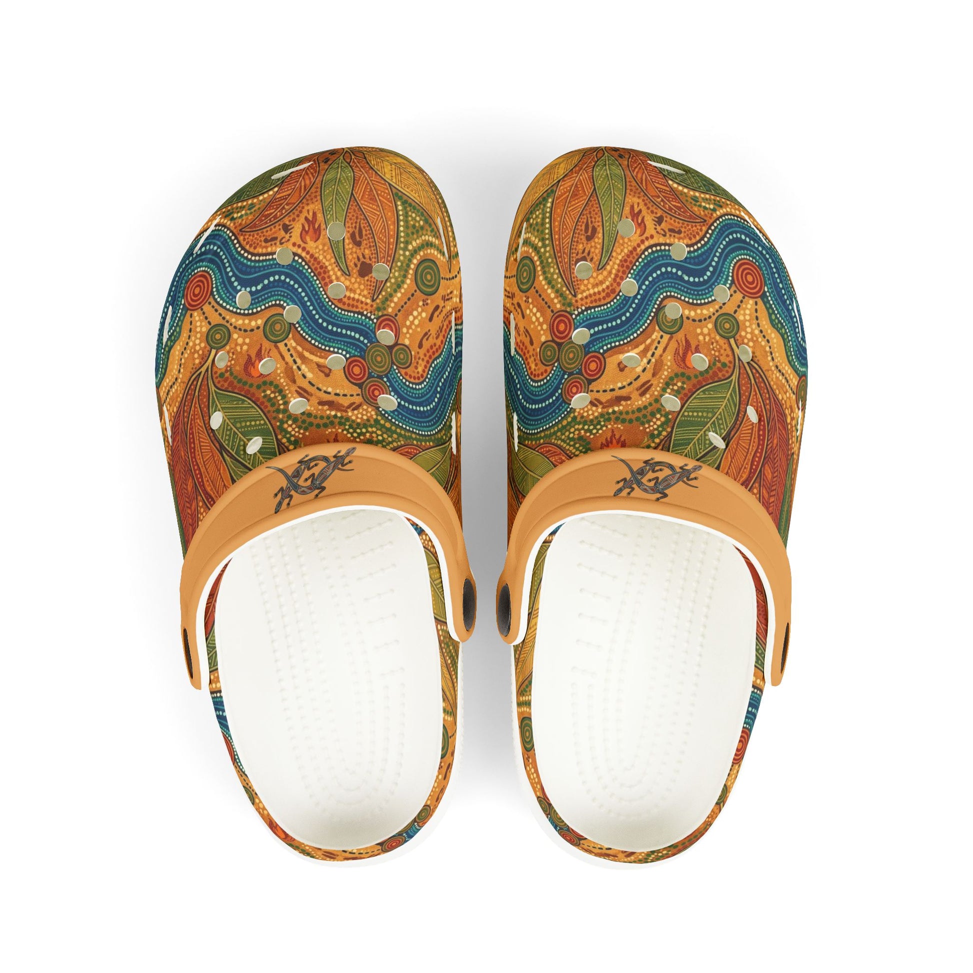 Casual slip-on clogs with tan strap, colorful Aboriginal art uppers and white inner sole.
