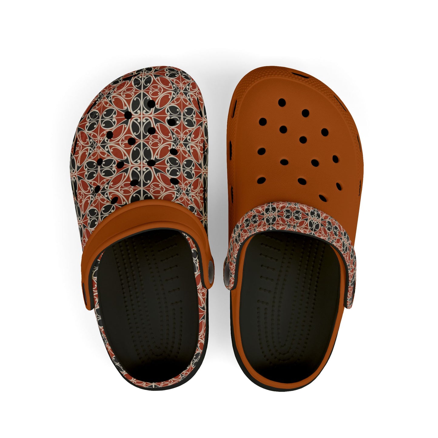 Māoritanga slip-on clogs with patterned upper, tan back, and dark perforated toe
