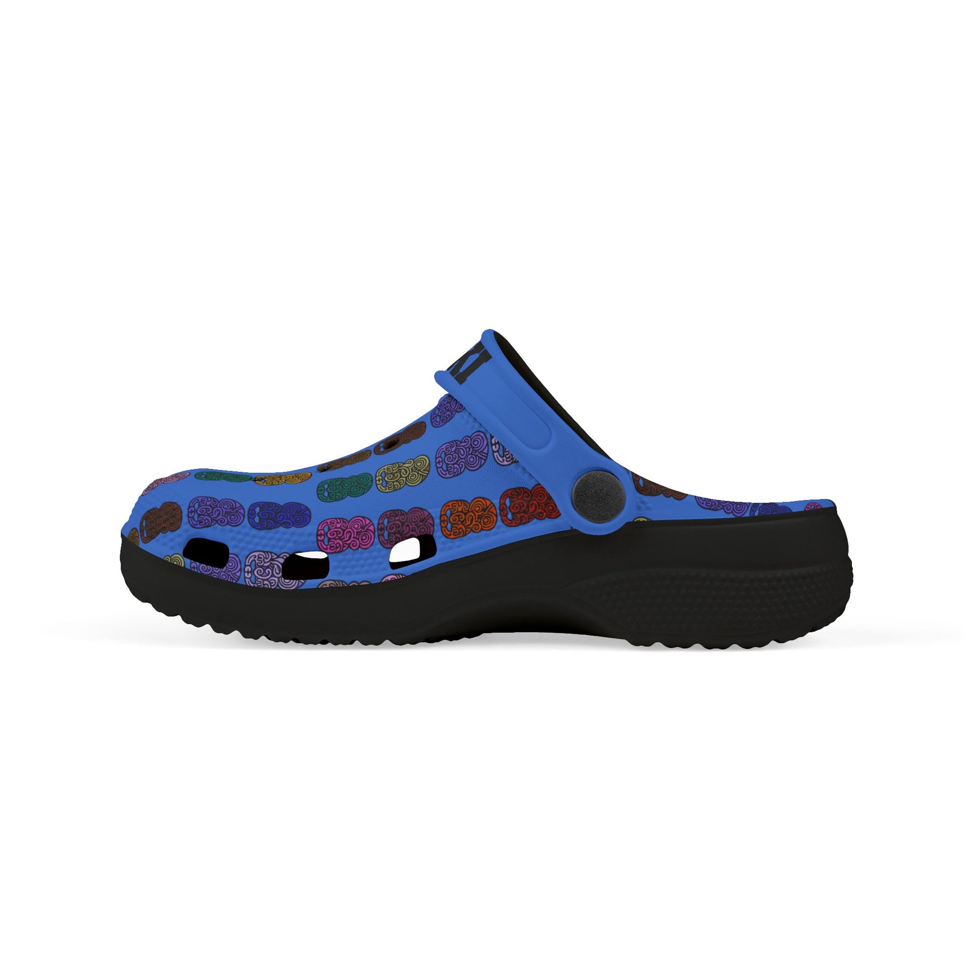 Kids casual clog shoes, side angle: blue patterned upper with black tread sole