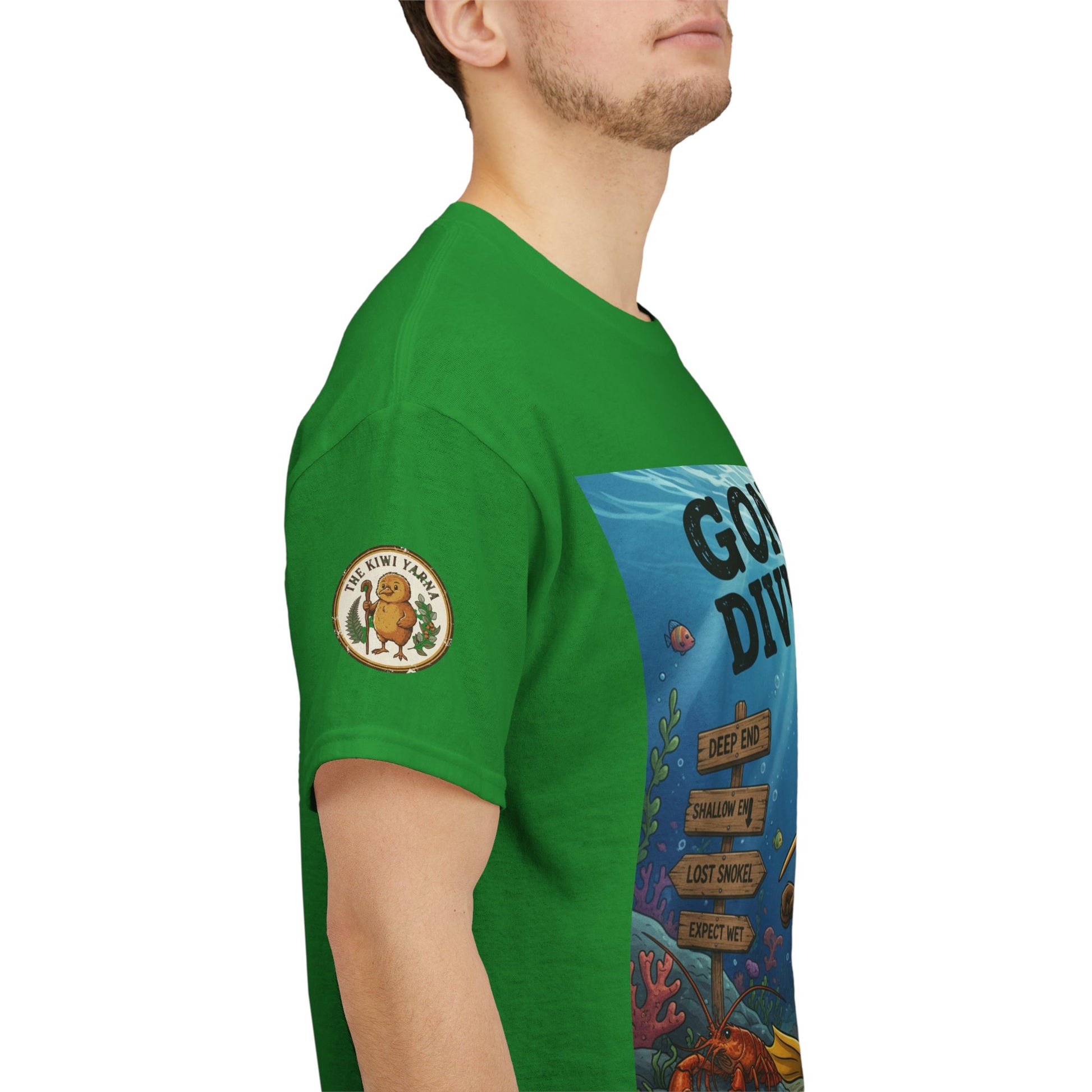 Green T-shirt with “GONE DIVING…” side graphic and round sleeve patch
