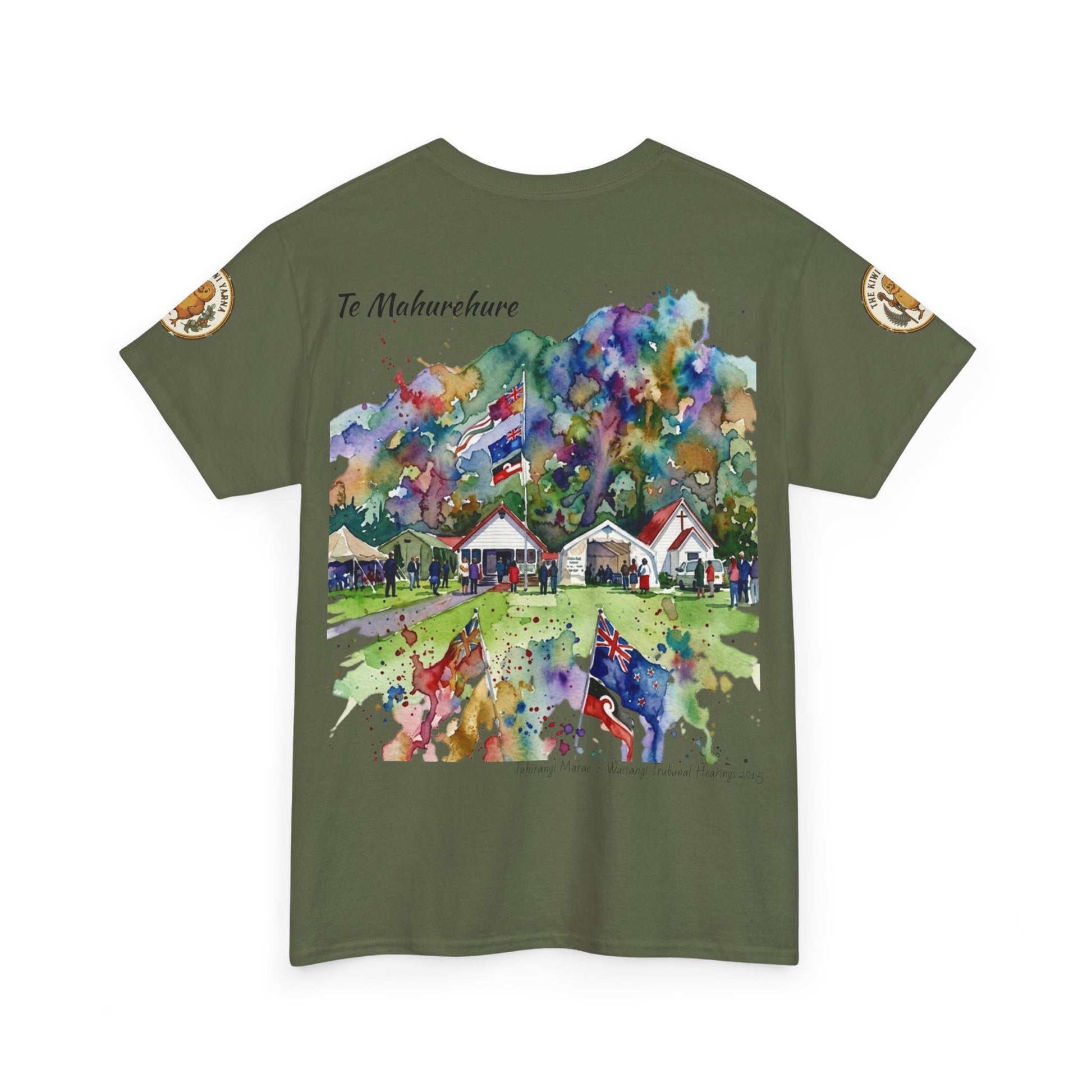 Olive green graphic T-shirt with colorful town mural-style front print and sleeve patches