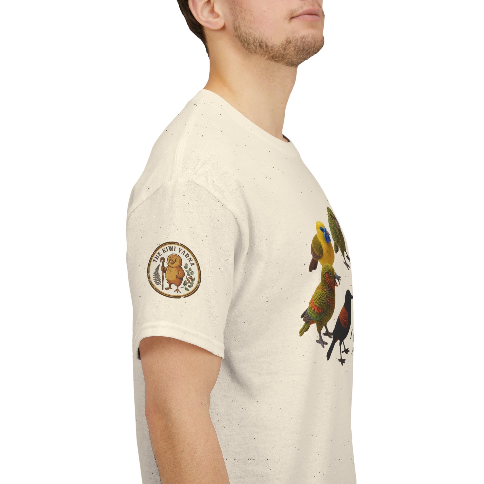 Cream T-shirt with left sleeve patch and colorful birds and pizza graphic