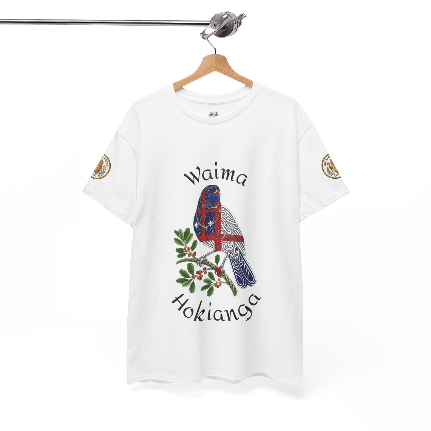 White T-shirt hanging with “Waima Hokianga” bird and green foliage graphic