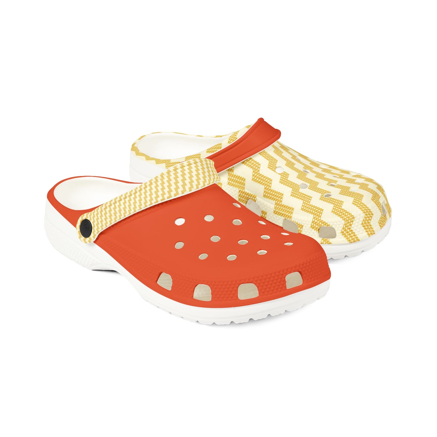 Poutama slip-on clogs with orange perforated front, zigzag upper, and white sole