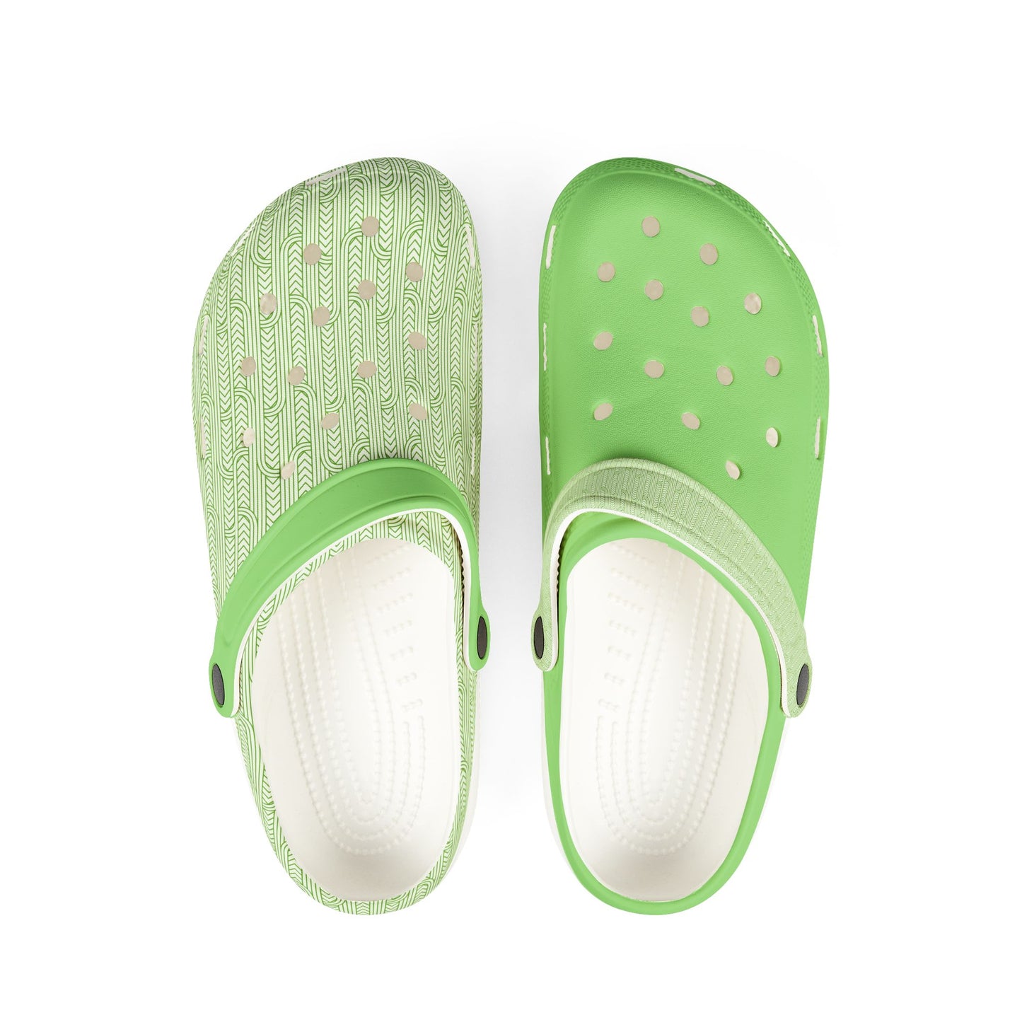 Maoritanga slip-on clogs with green patterned upper, perforated top, white footbed