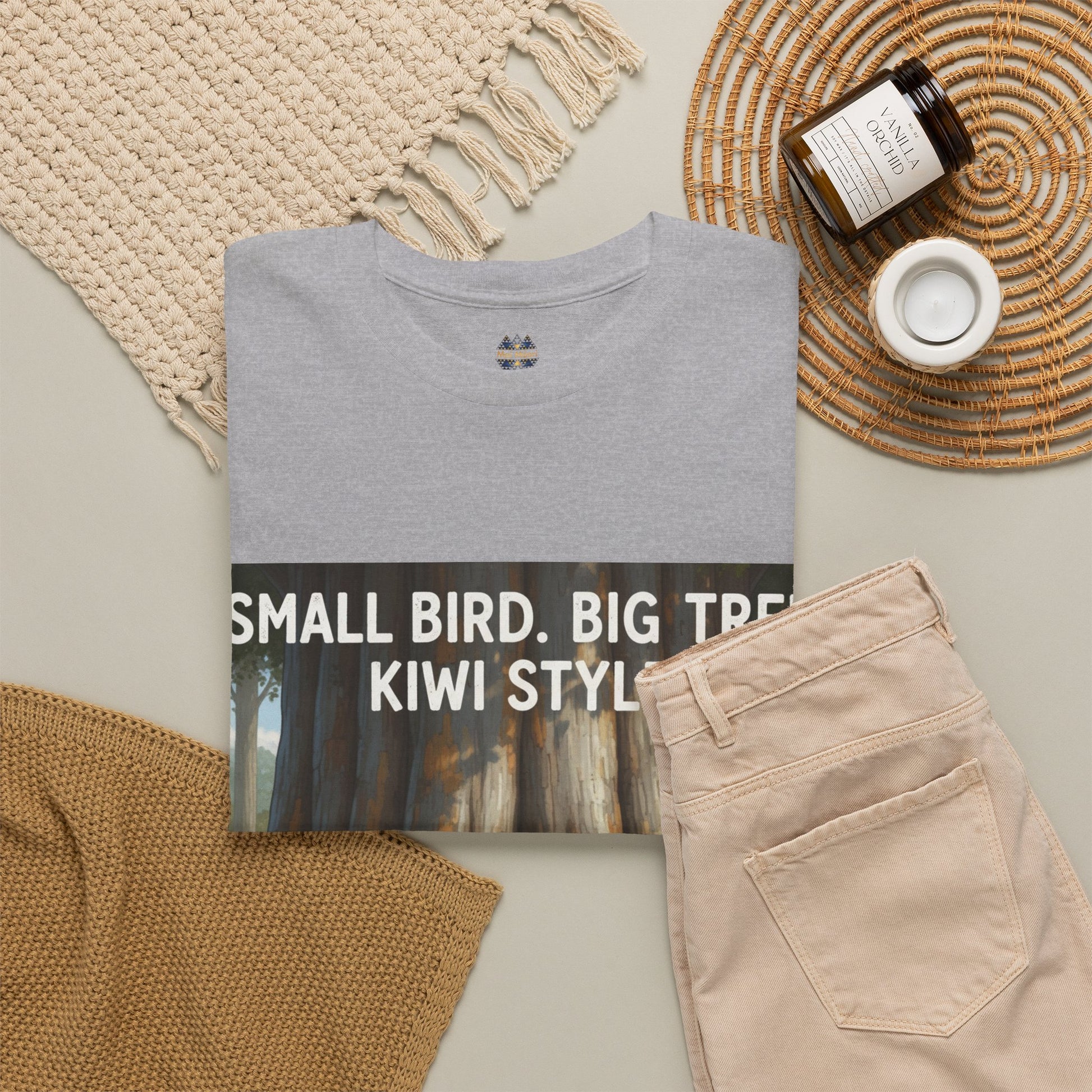 Heather gray crewneck T-shirt with small chest icon and partial forest graphic print