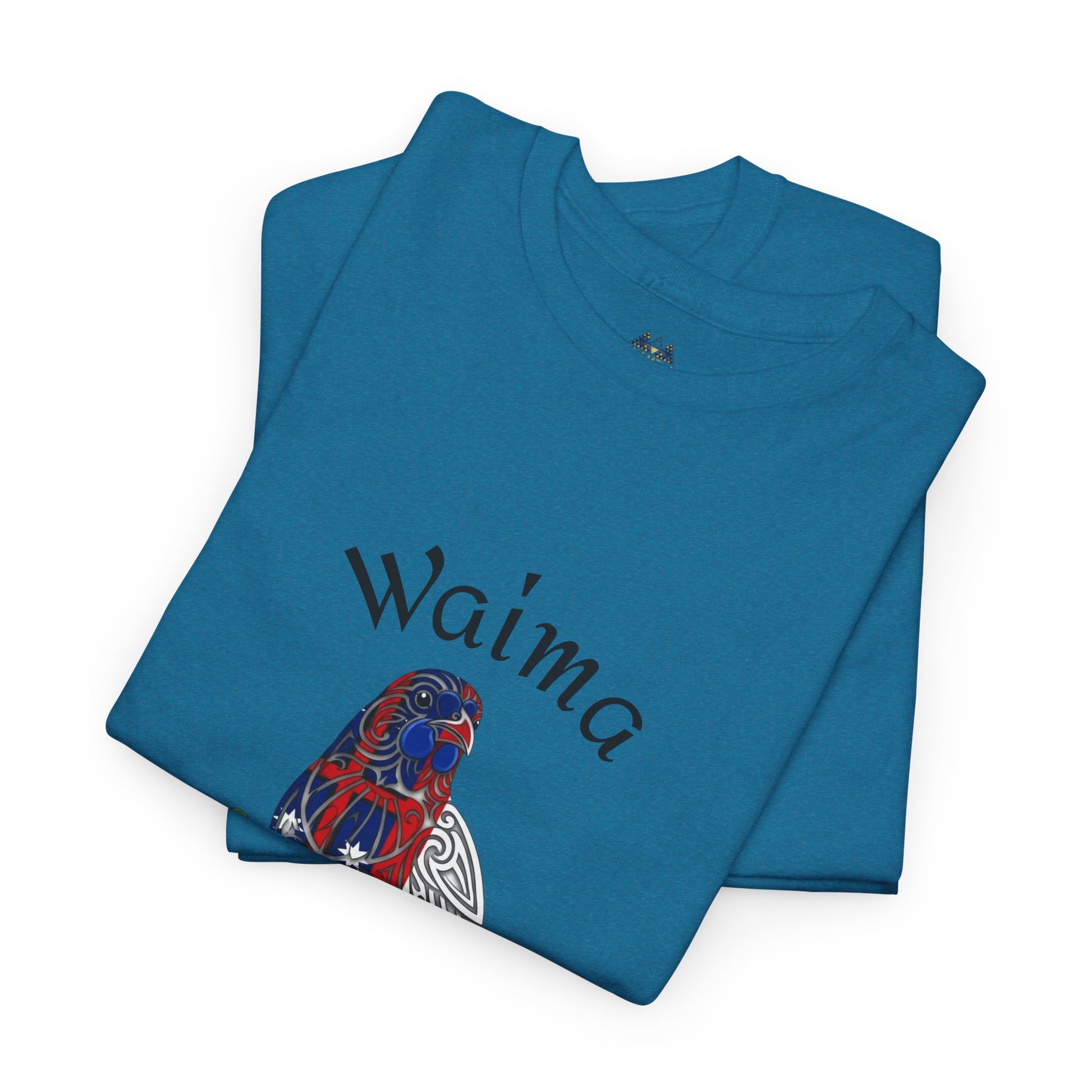 Folded teal T-shirt with bird graphic and script text