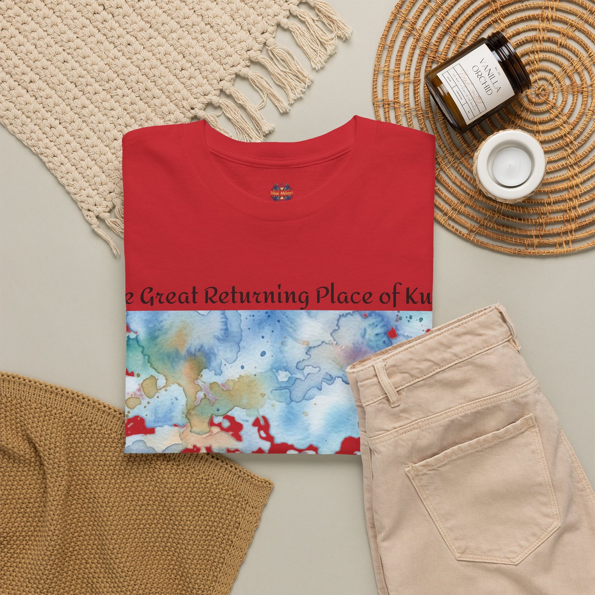 Red crew-neck graphic T-shirt laid flat with centered landscape panel print.