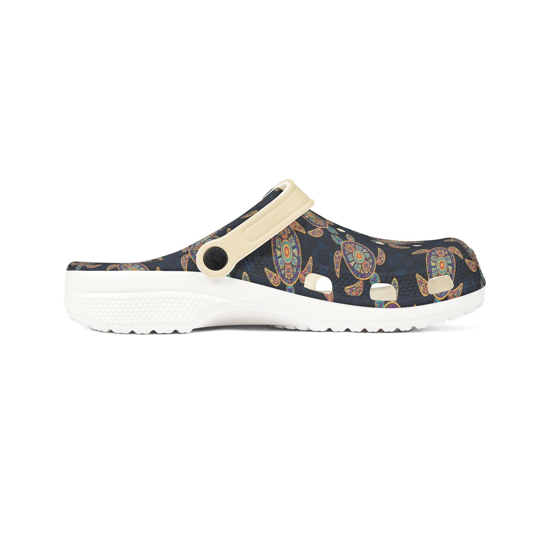 Croc-style clog side view, dark navy turtle print upper with light beige strap and sole