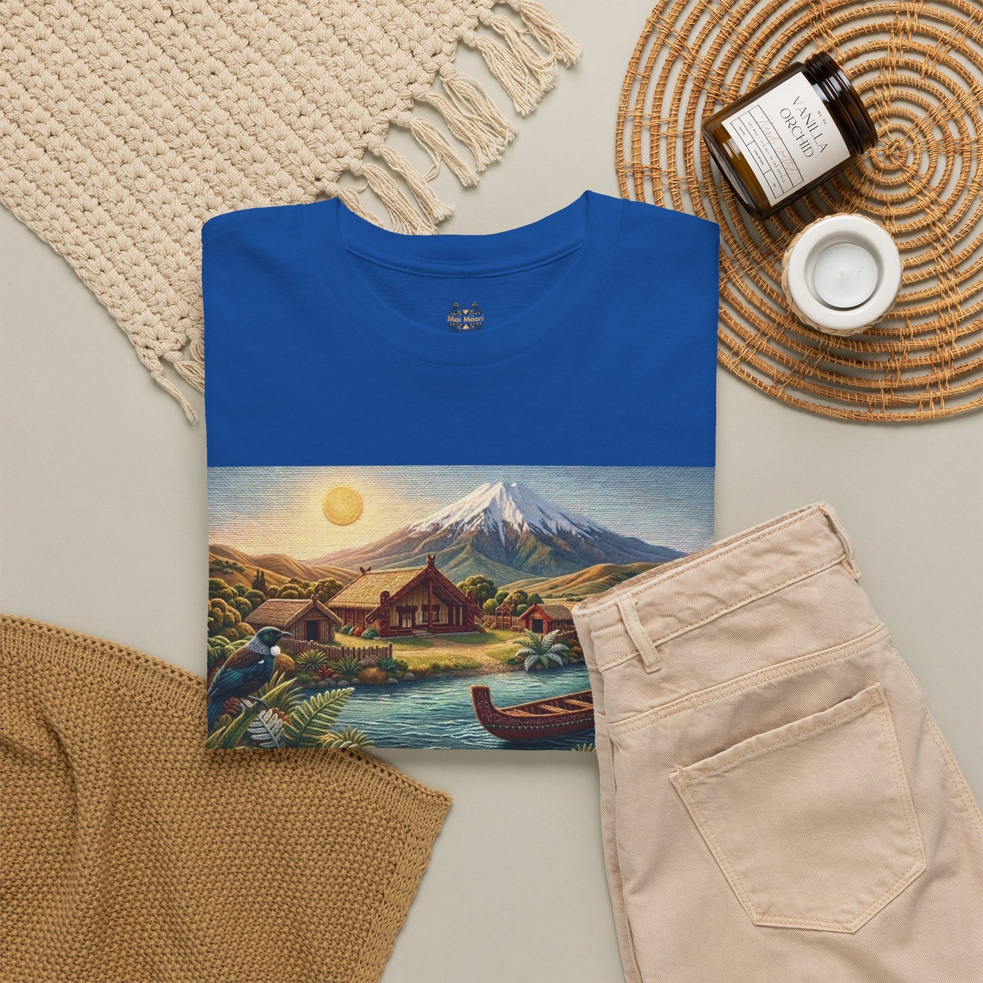 Royal blue crewneck T-shirt with landscape canoe graphic panel and small chest emblem