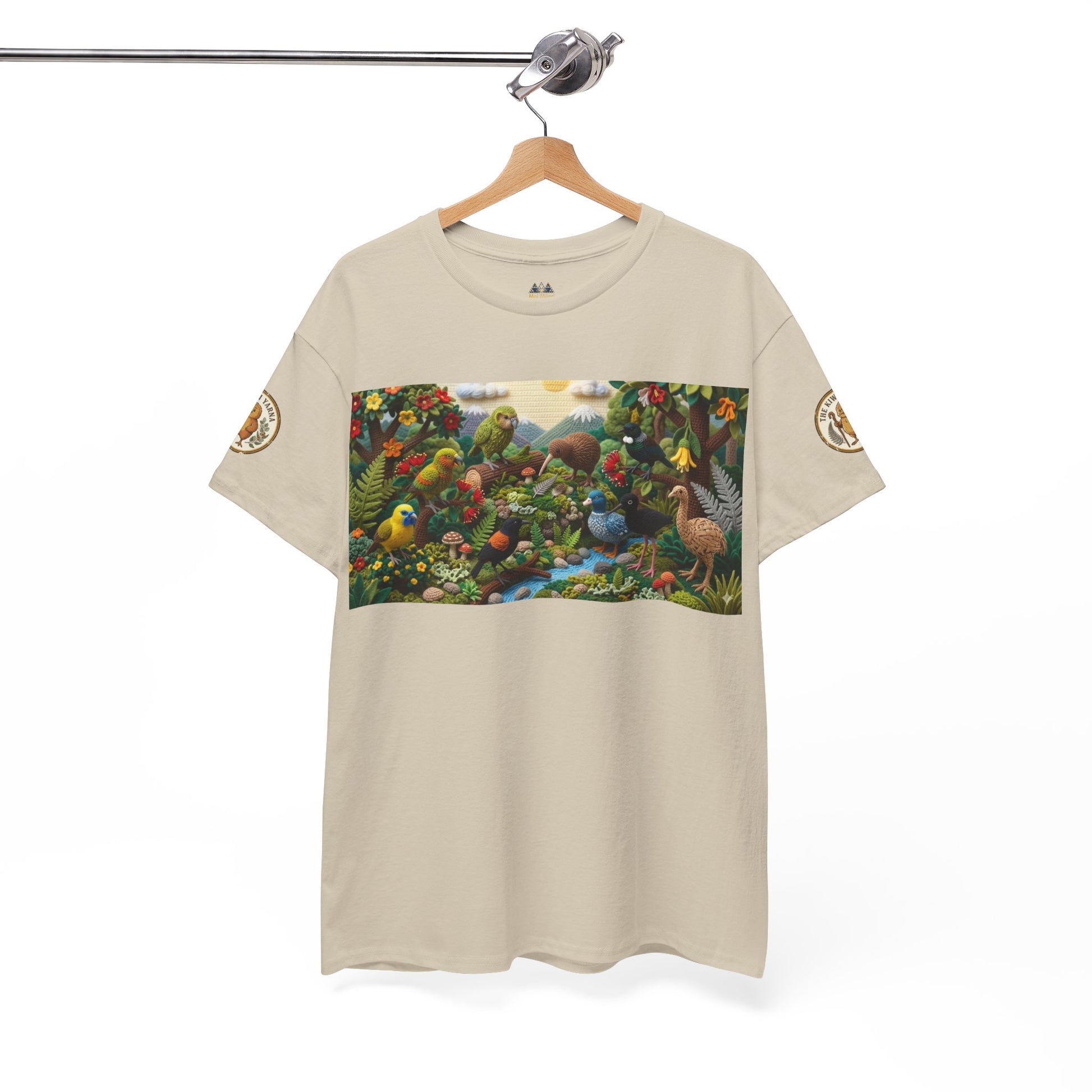 Sand hanging crew-neck T-shirt with birds-and-forest rectangular graphic and sleeve patch.