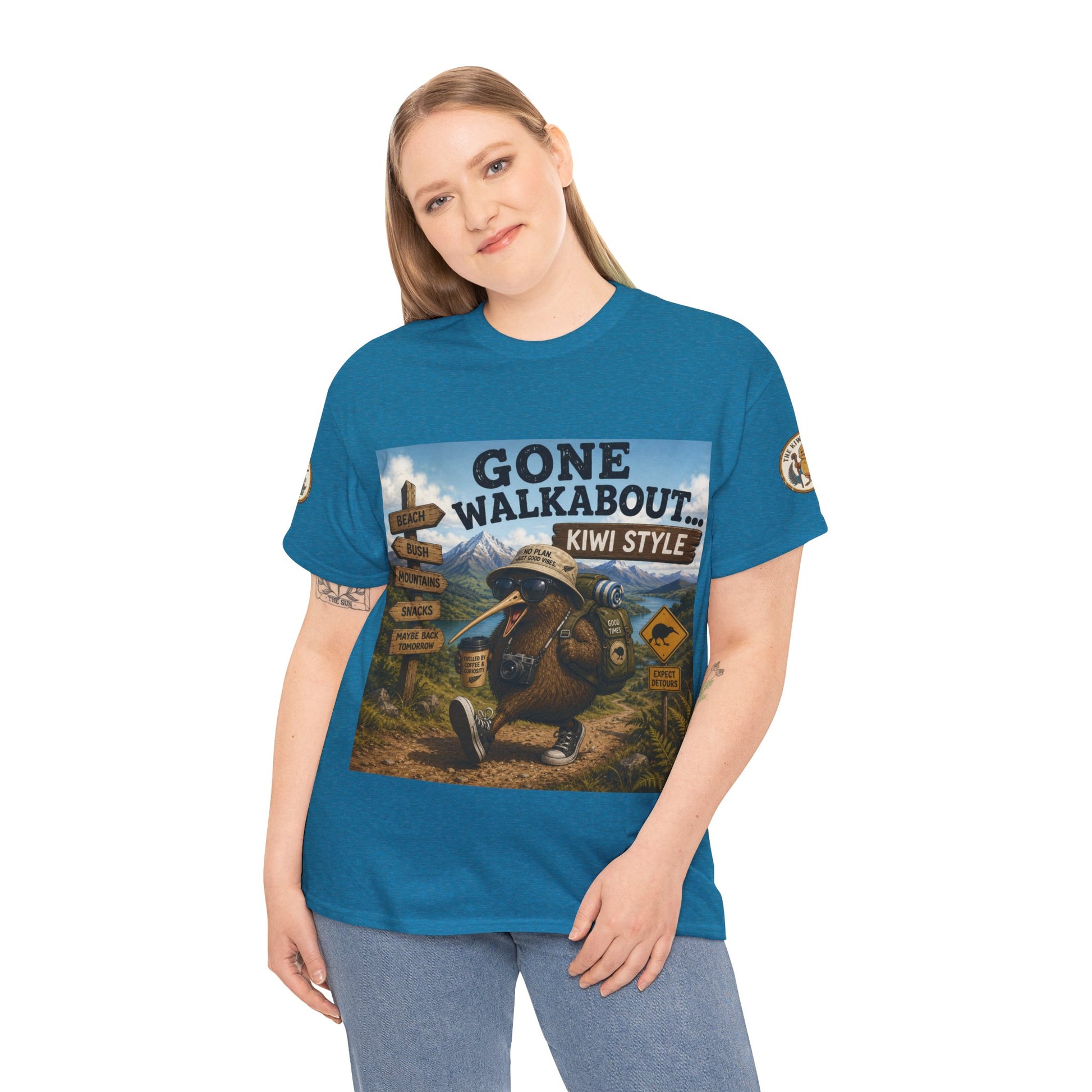 Teal short-sleeve crewneck T-shirt on model with kiwi-style adventure front graphic.