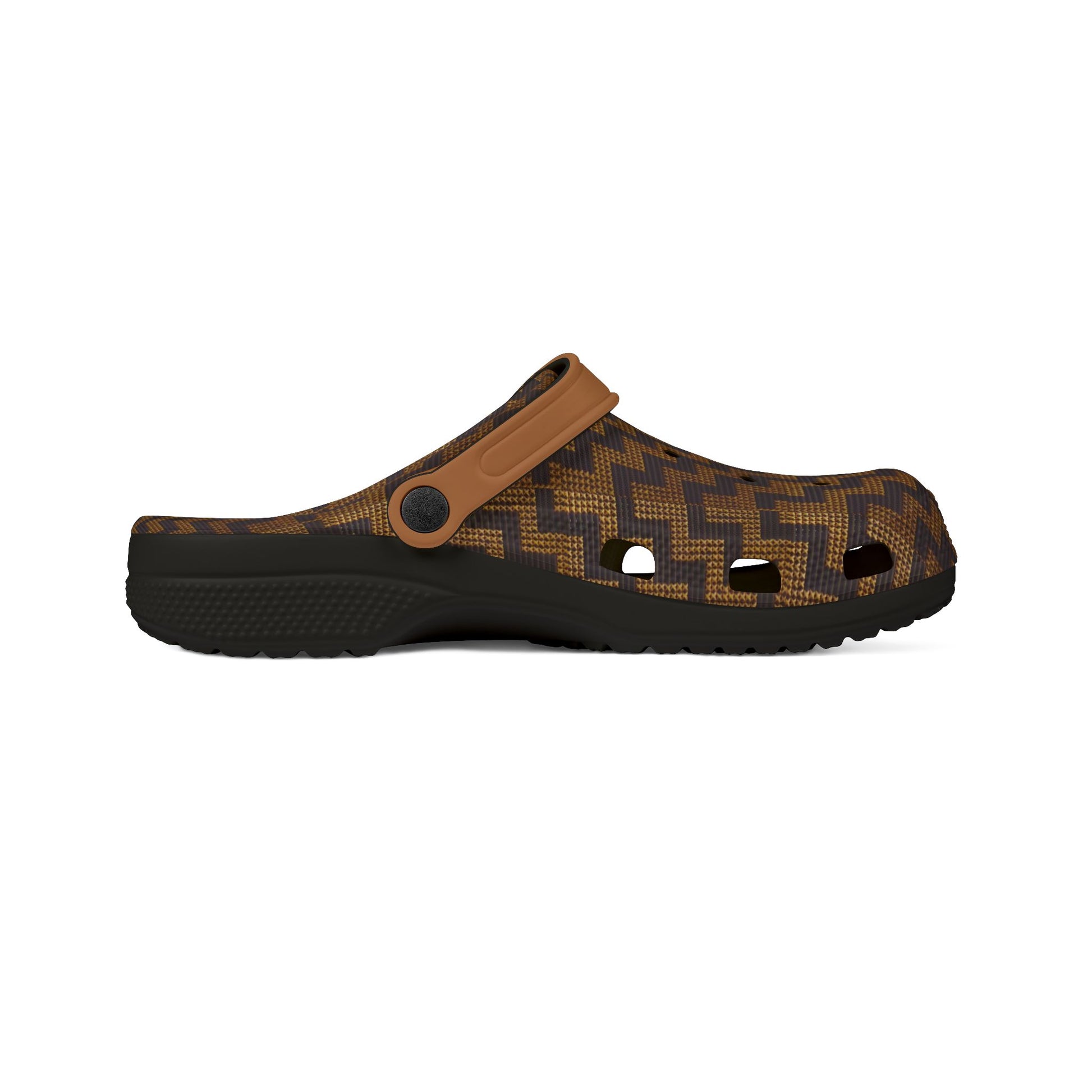 Tukutuku clog sandals side view with tan upper, patterned strap, and dark rubber sole