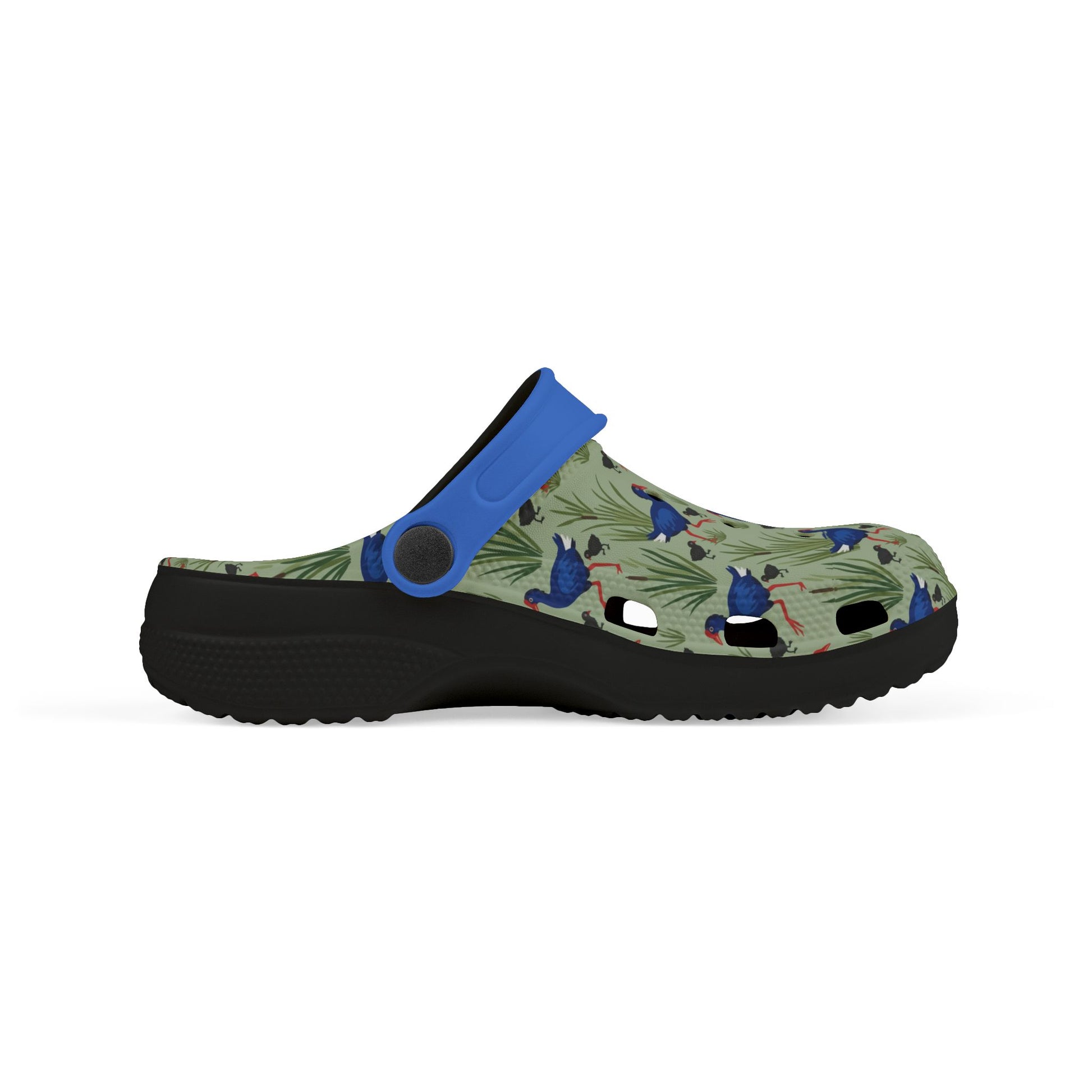 Kids slip-on clogs side view, blue sole, patterned upper with blue strap.