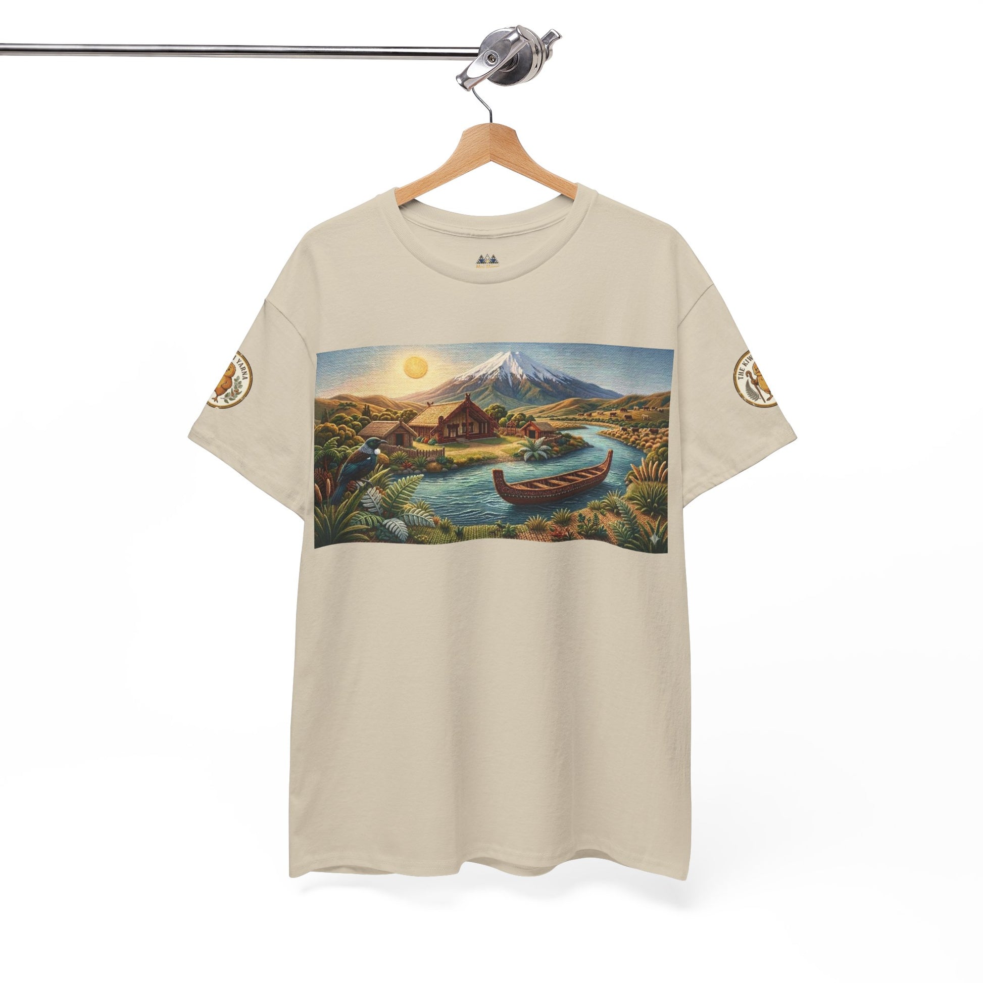Cream graphic t-shirt on hanger with landscape print and circular sleeve patch detail