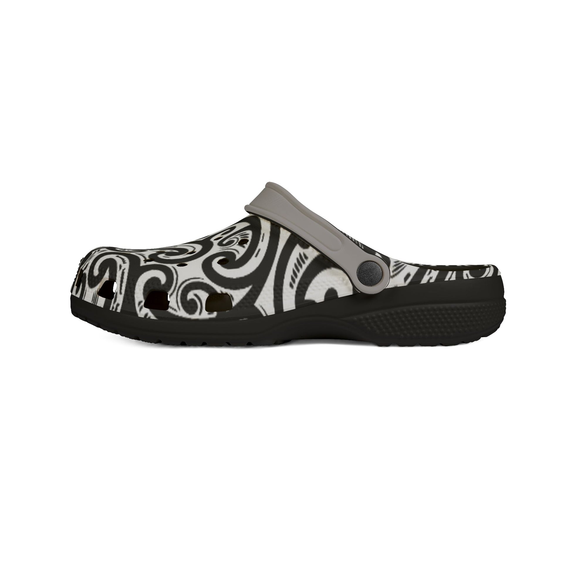 Croc-style clog with black-and-white patterned top strap and dark textured sole