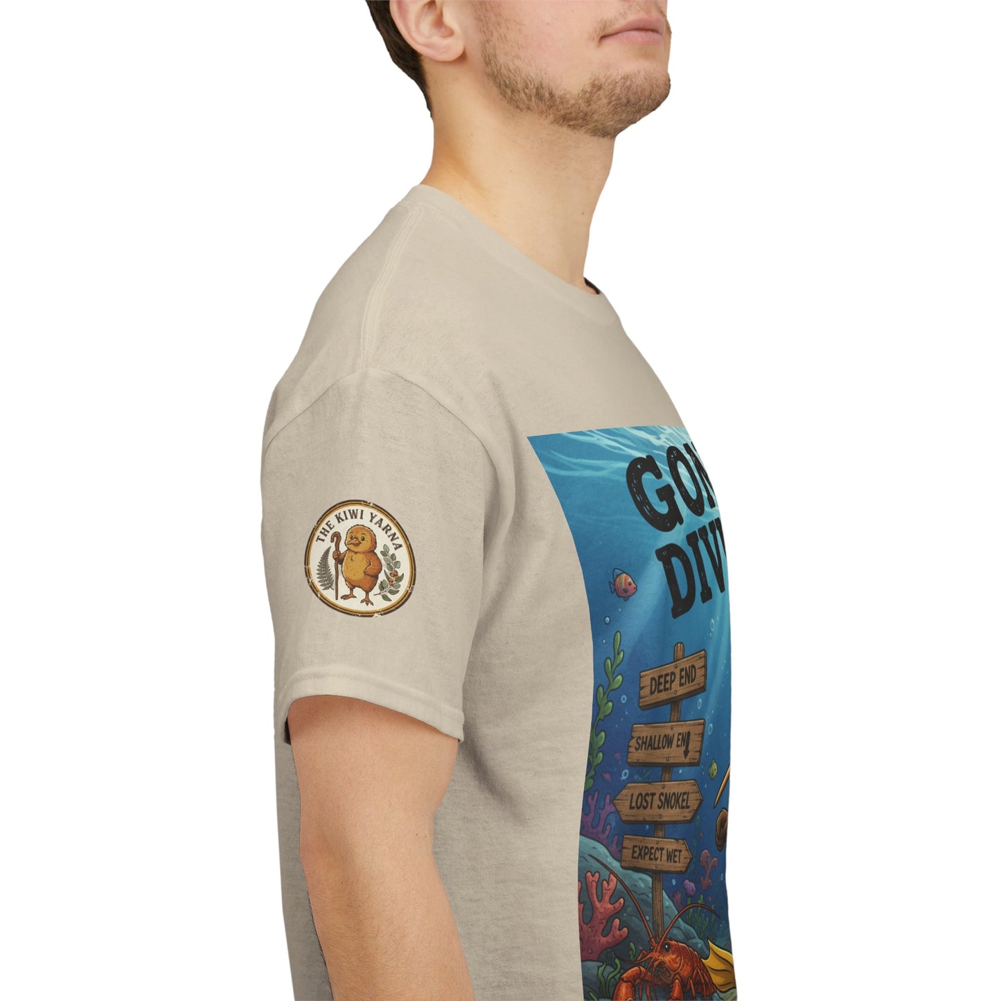 Natural/cream crew-neck T-shirt with round sleeve emblem and side “Gone Diving” print