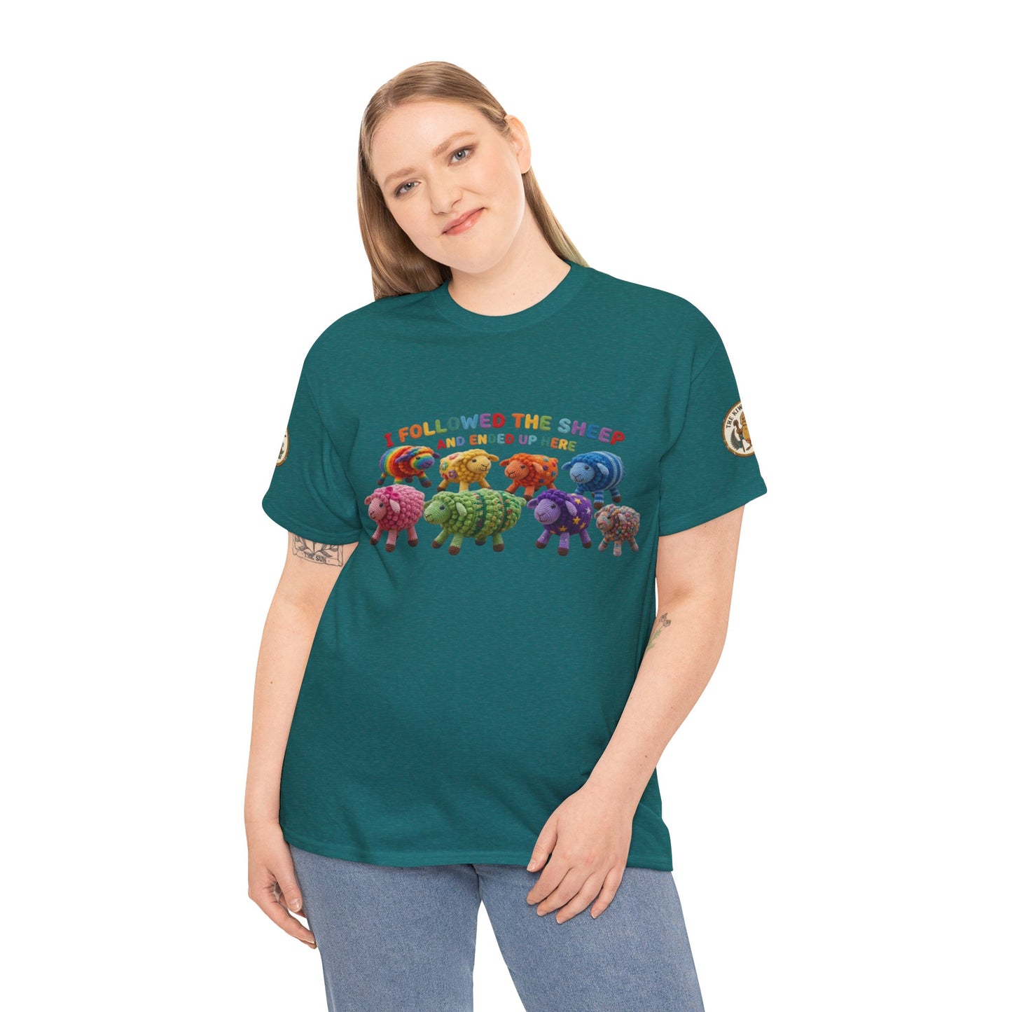 Teal graphic crewneck T-shirt with sheep illustration and colorful slogan banner