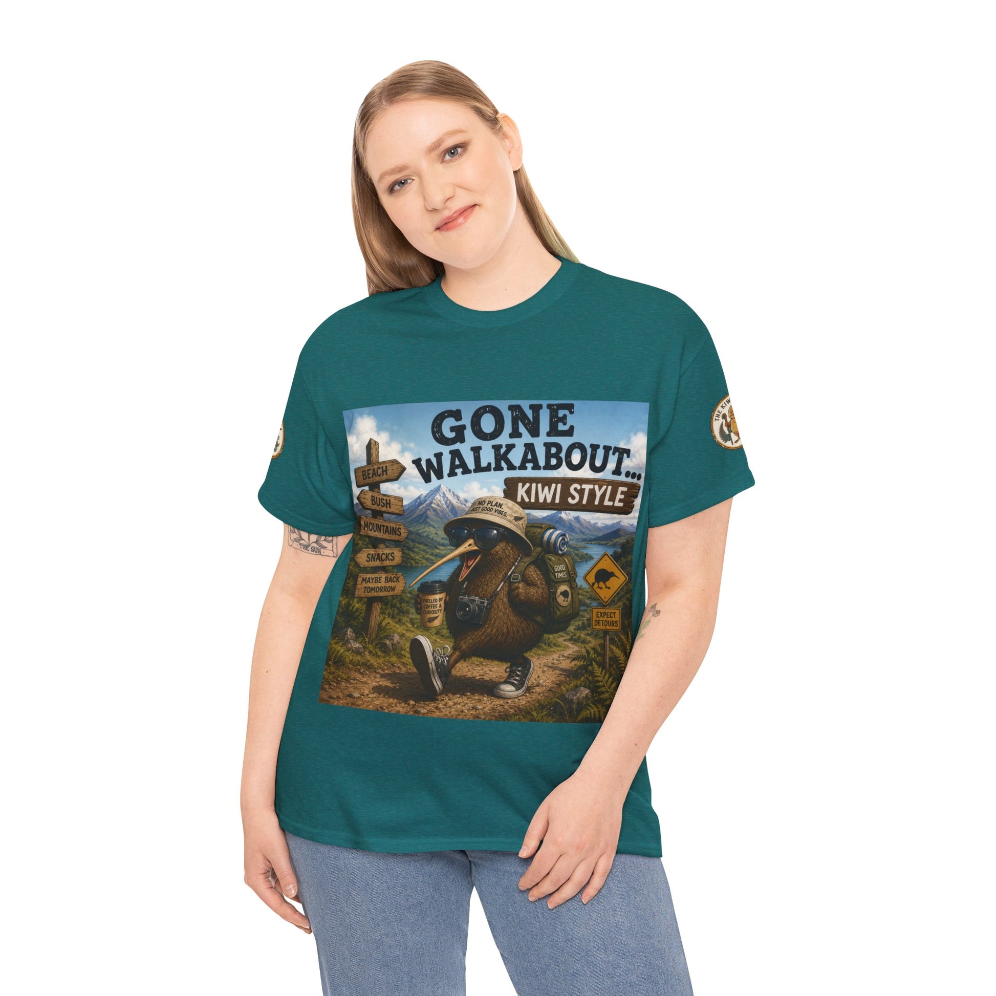 Teal short-sleeve crewneck T-shirt on model with kiwi-style adventure front graphic.
