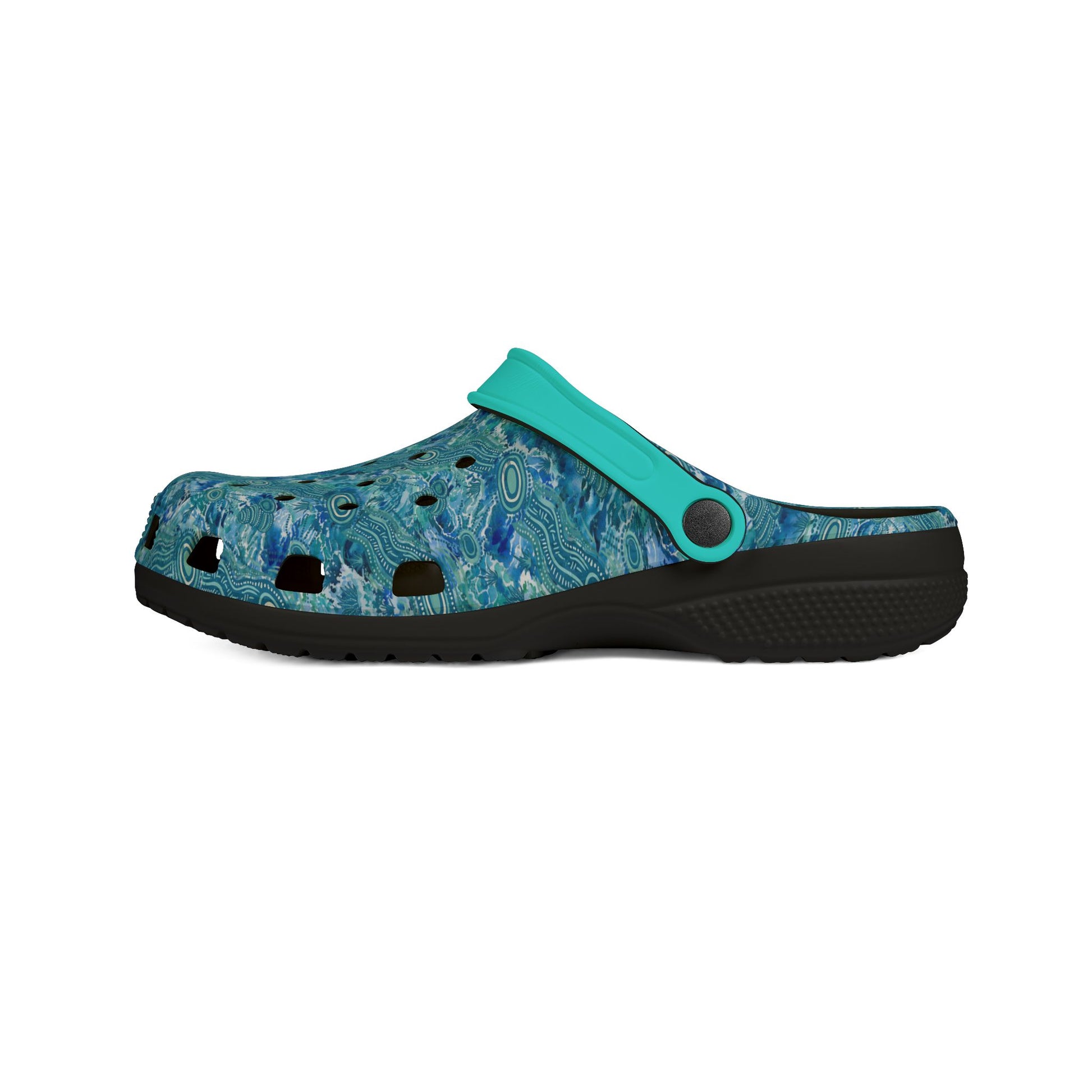Teal and blue patterned clog shoes with strap and textured black outsole, side view