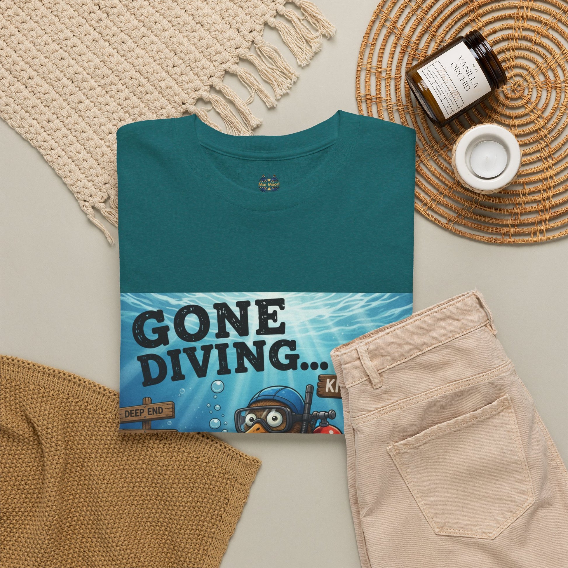 Teal T-shirt with “GONE DIVING…” front graphic panel
