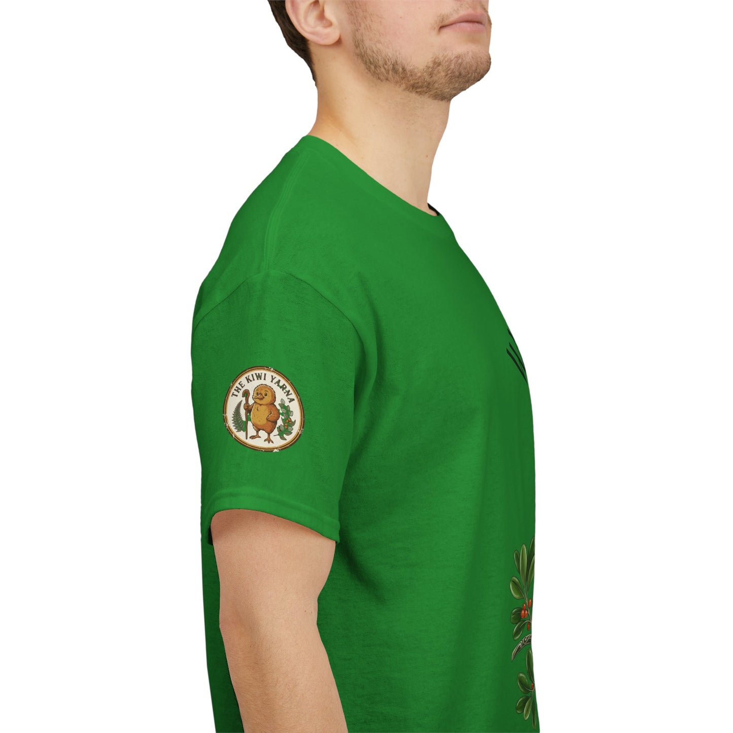 Green t-shirt with bird logo on sleeve, side view