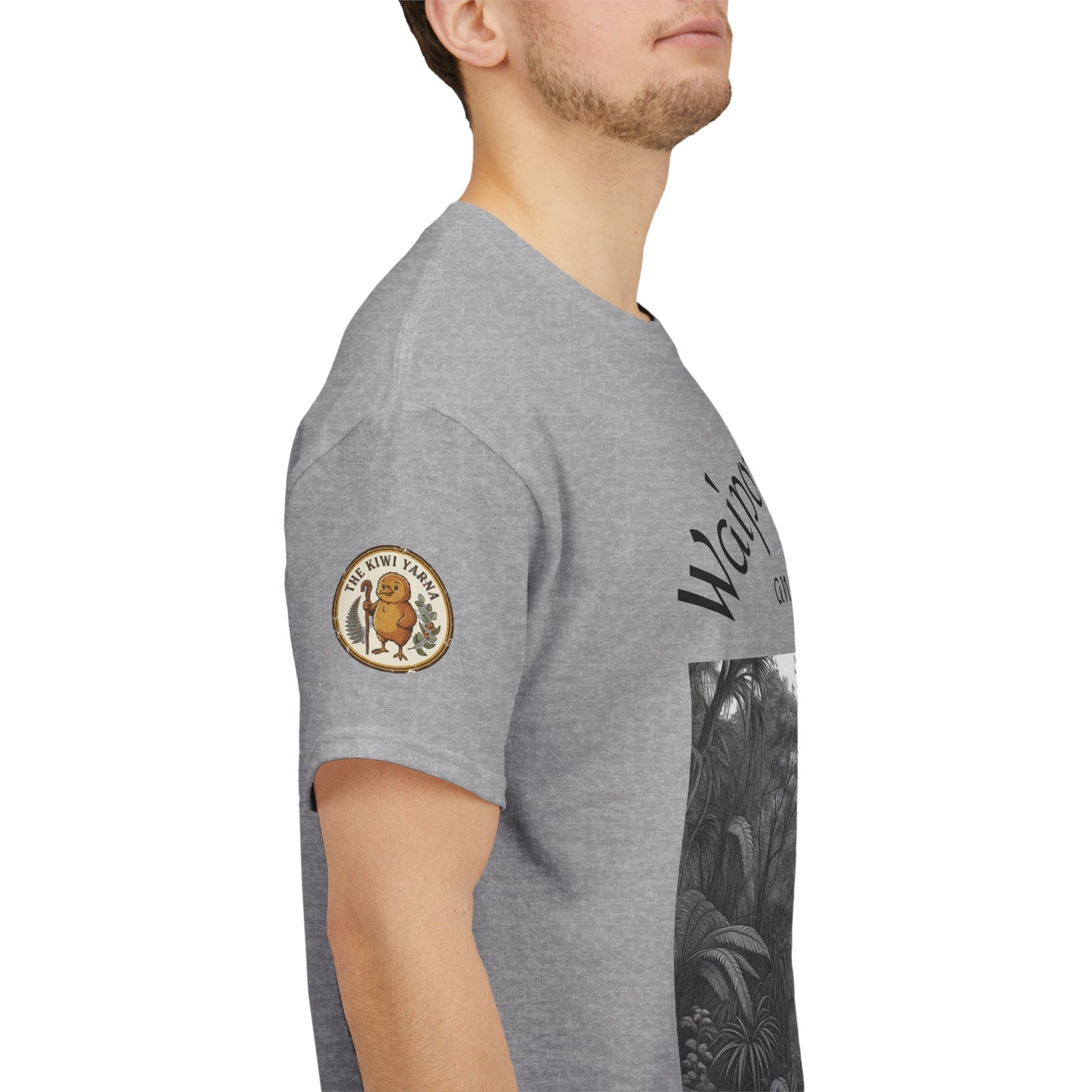 Heather gray t-shirt sleeve with circular logo patch and side forest print
