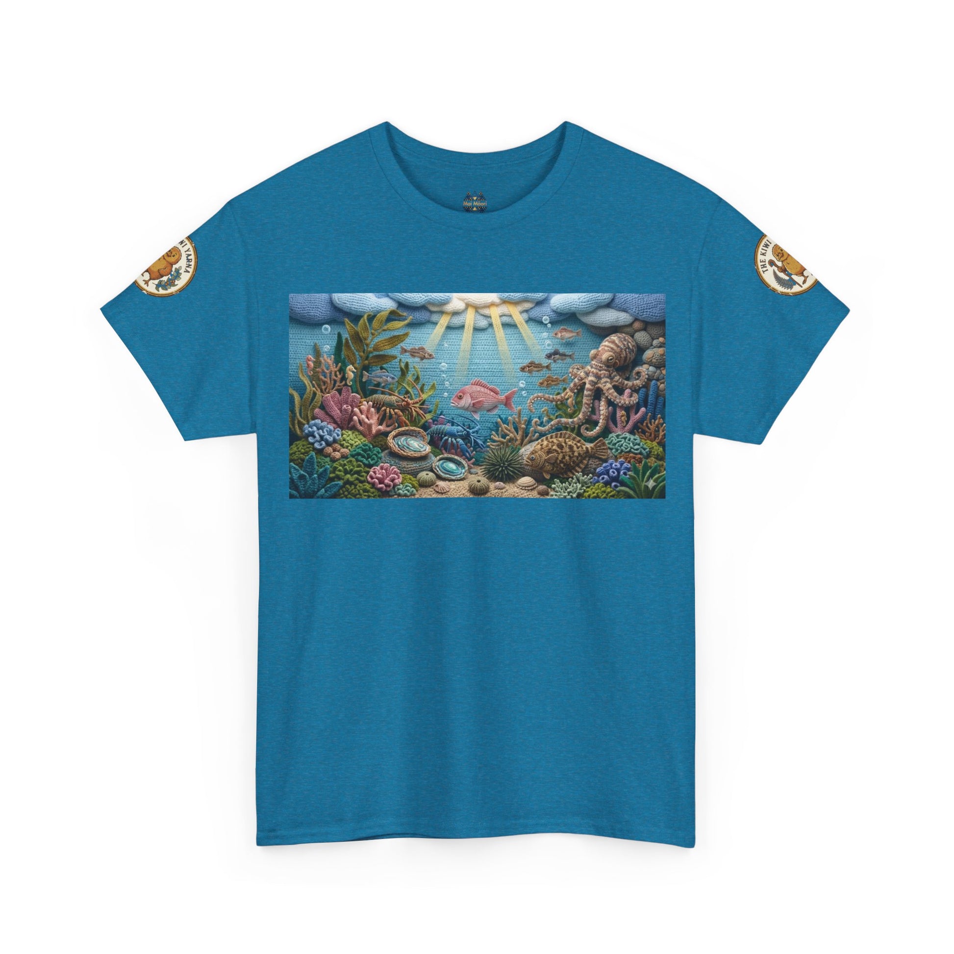 Blue T-shirt with sea scene graphic and circular shoulder patches