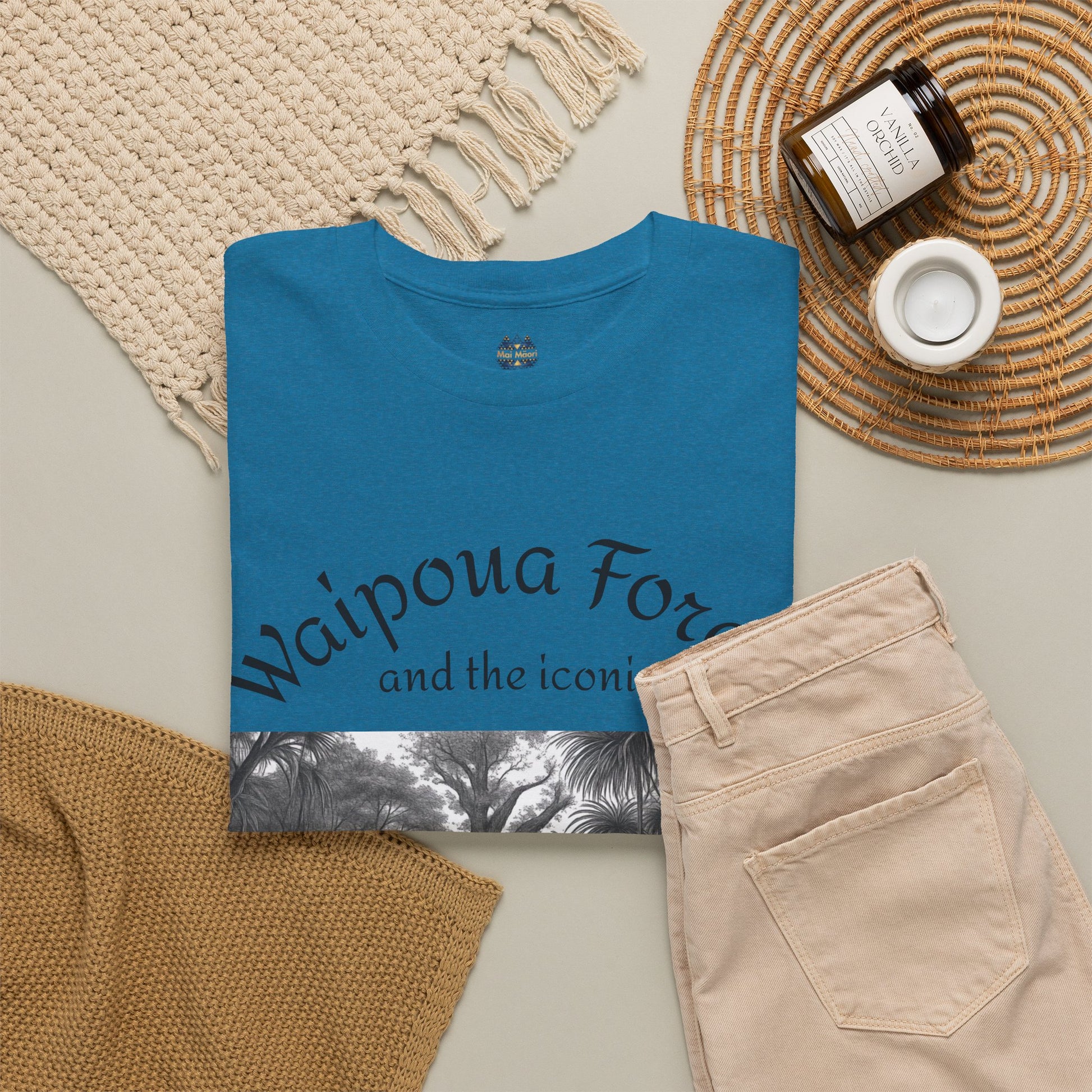 Blue T-shirt with front graphic illustration and crew neck; styled with jeans and accessories