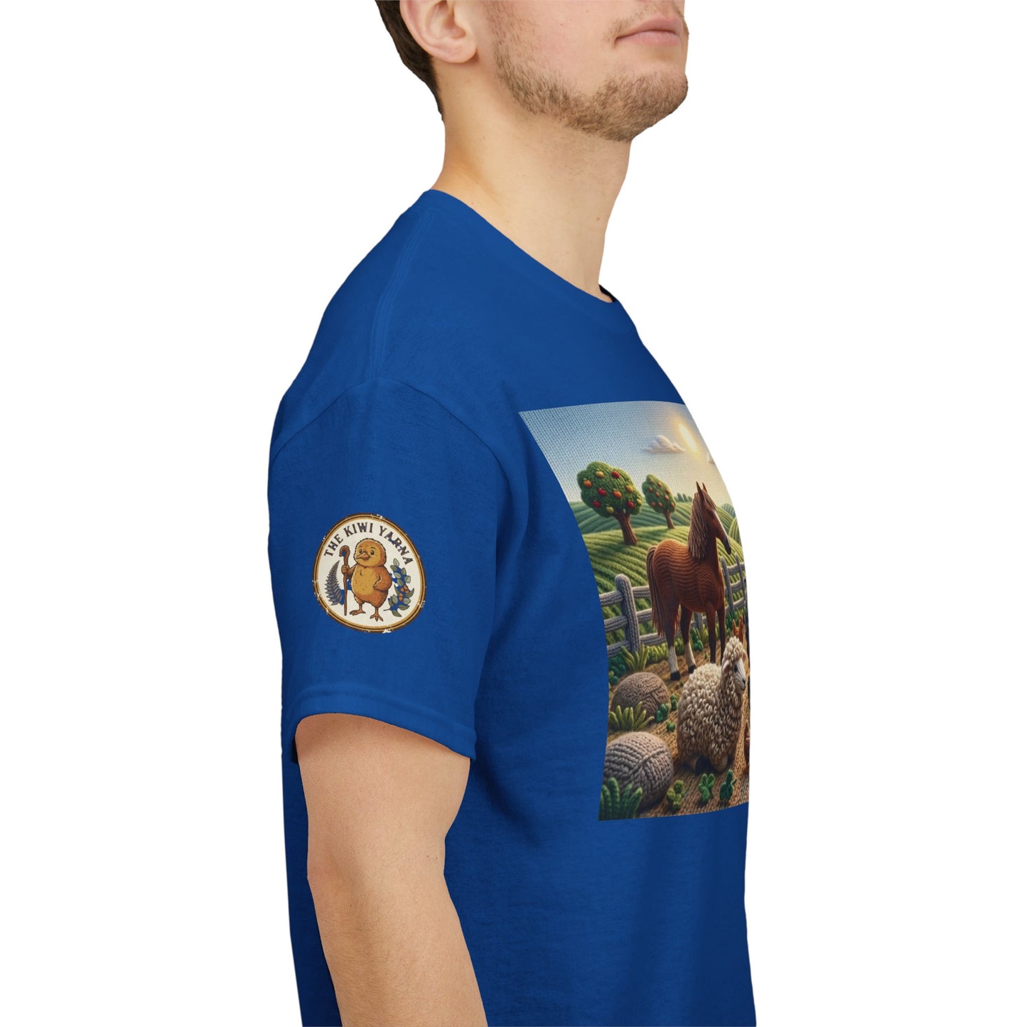 Royal blue T-shirt side view with farm animal and tractor graphic panel on chest.