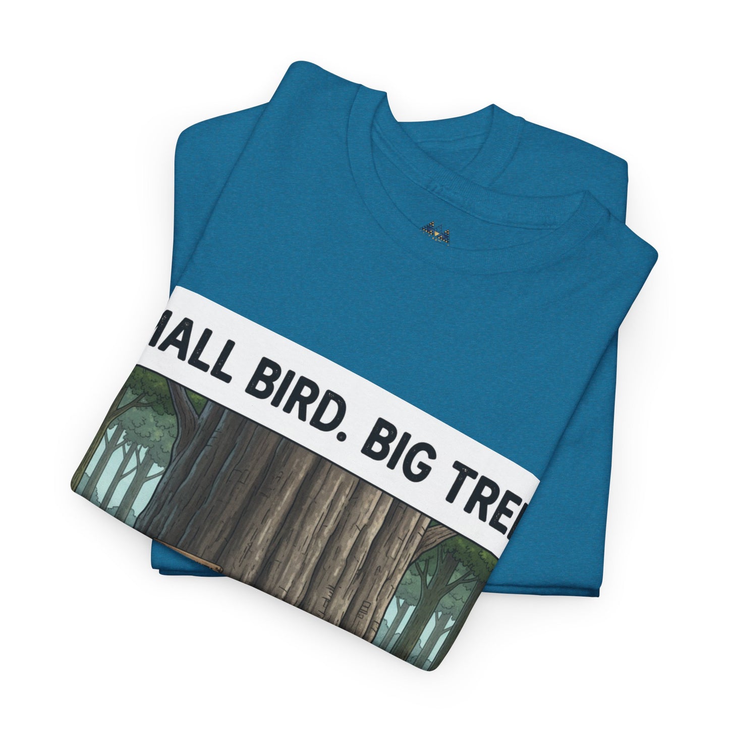 Teal folded T-shirt with diagonal "SMALL BIRD. BIG TREE" forest graphic