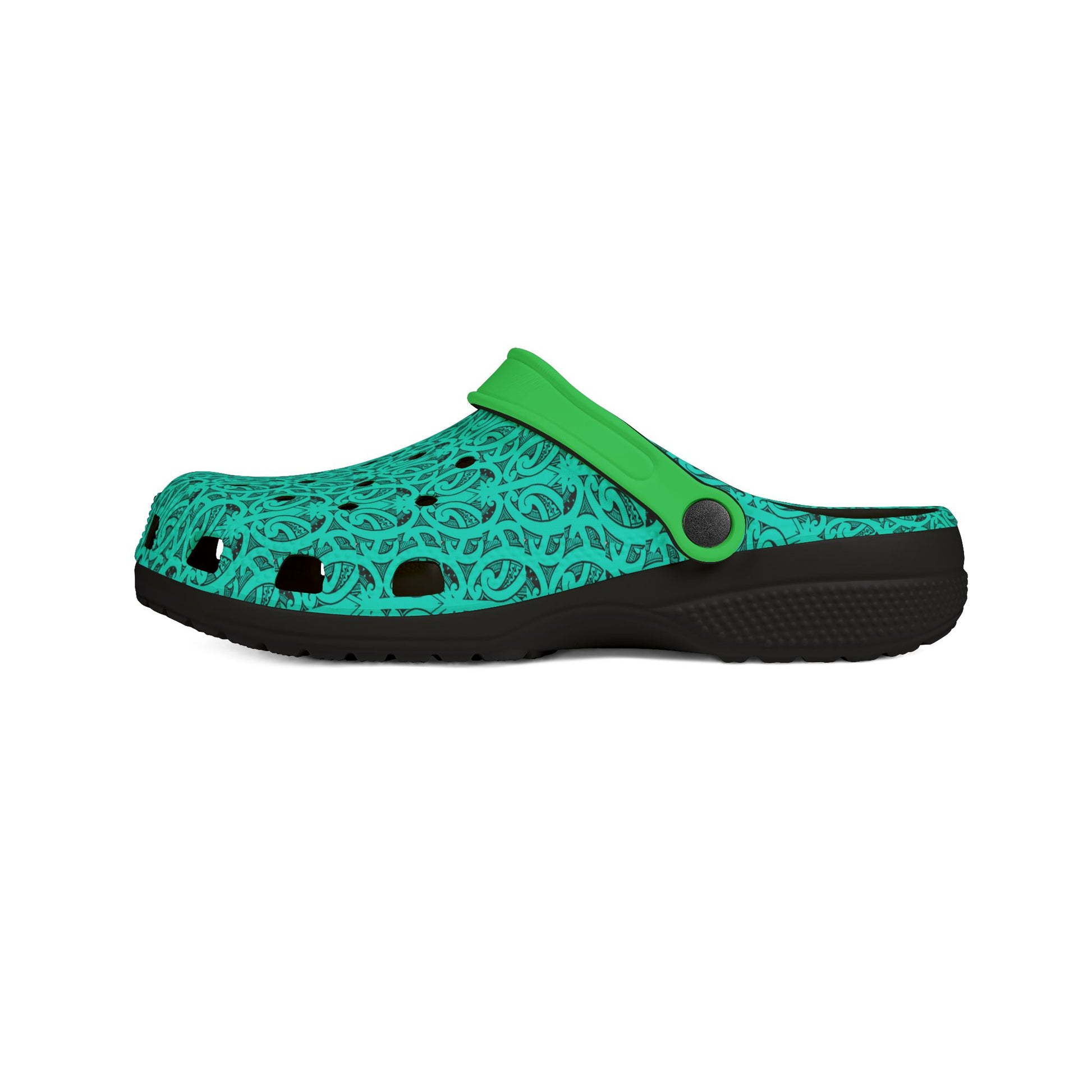 Teal patterned slip-on clogs with green strap and textured black outsole